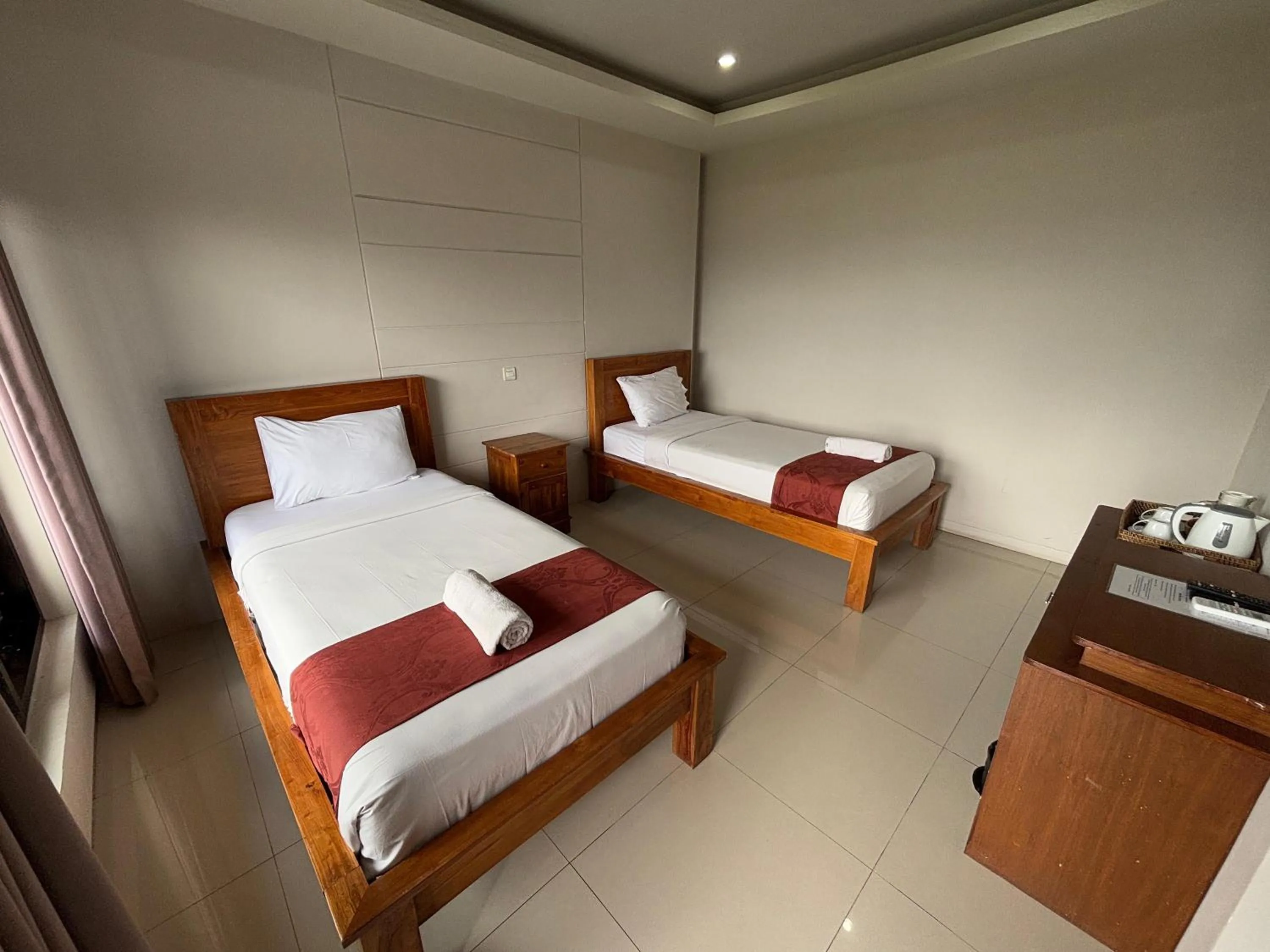 Bed in Caldera Hotel & Restaurant