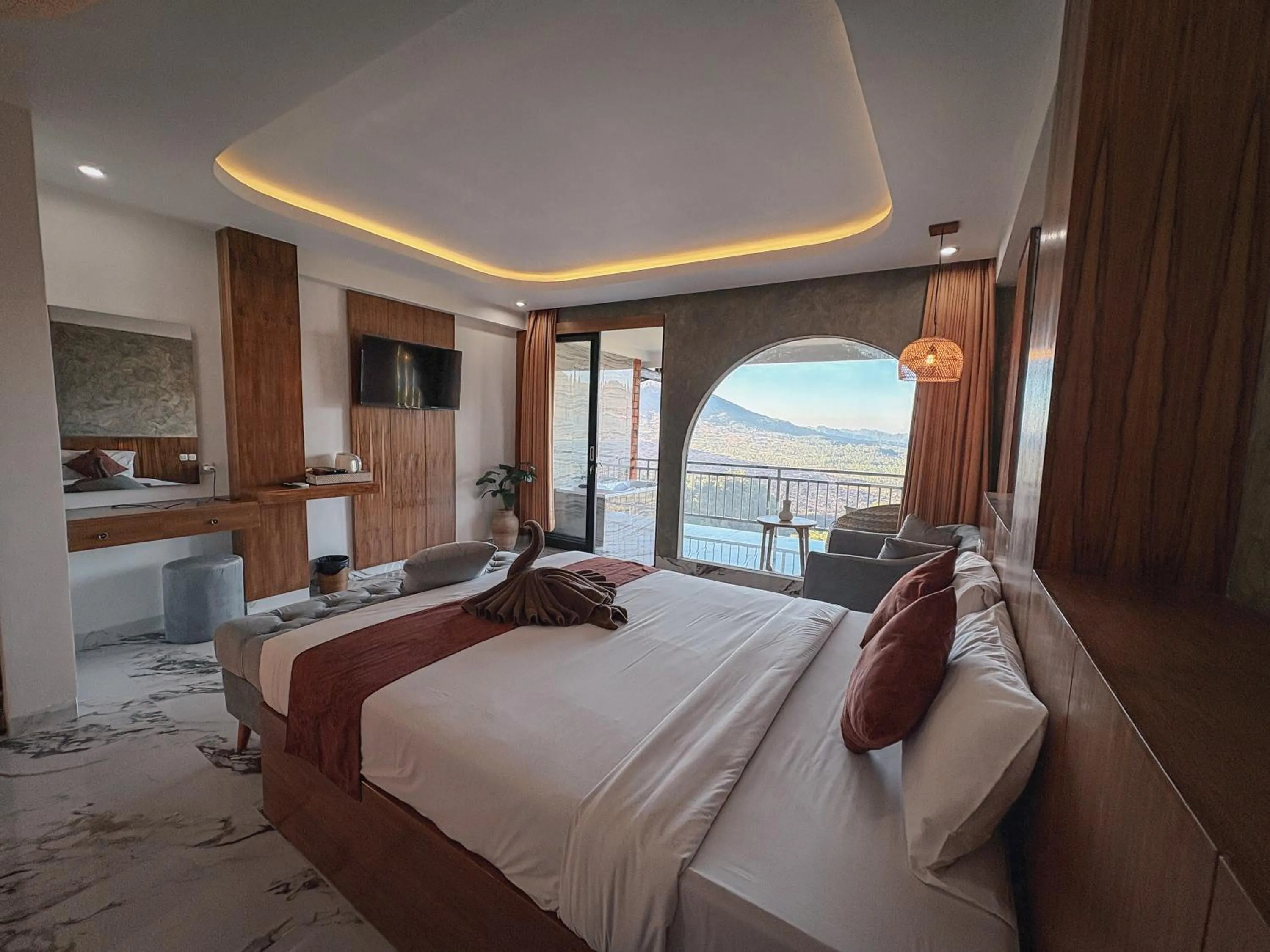 Bed in Caldera Hotel & Restaurant