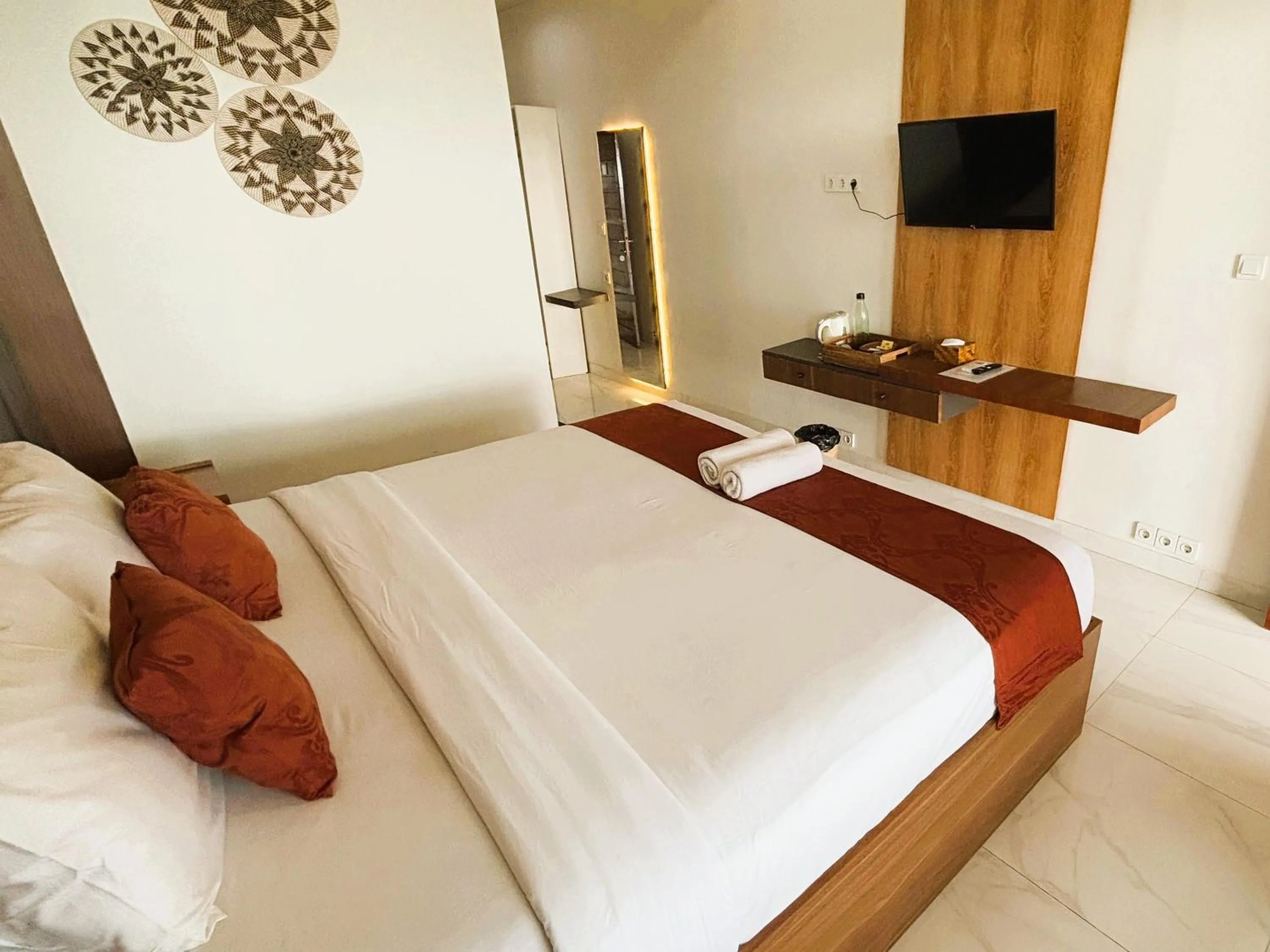 Bed in Caldera Hotel & Restaurant