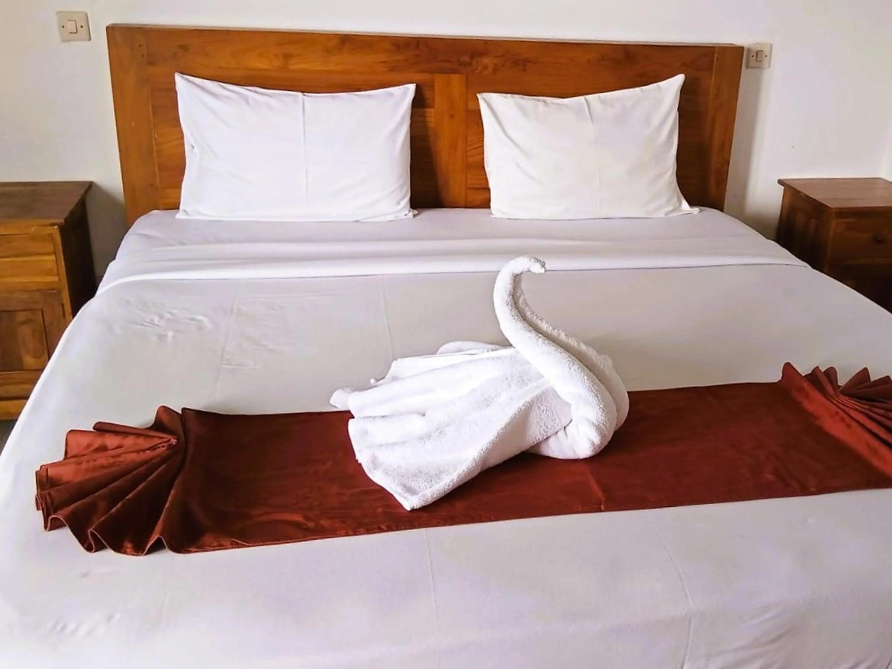 Bed in Caldera Hotel & Restaurant