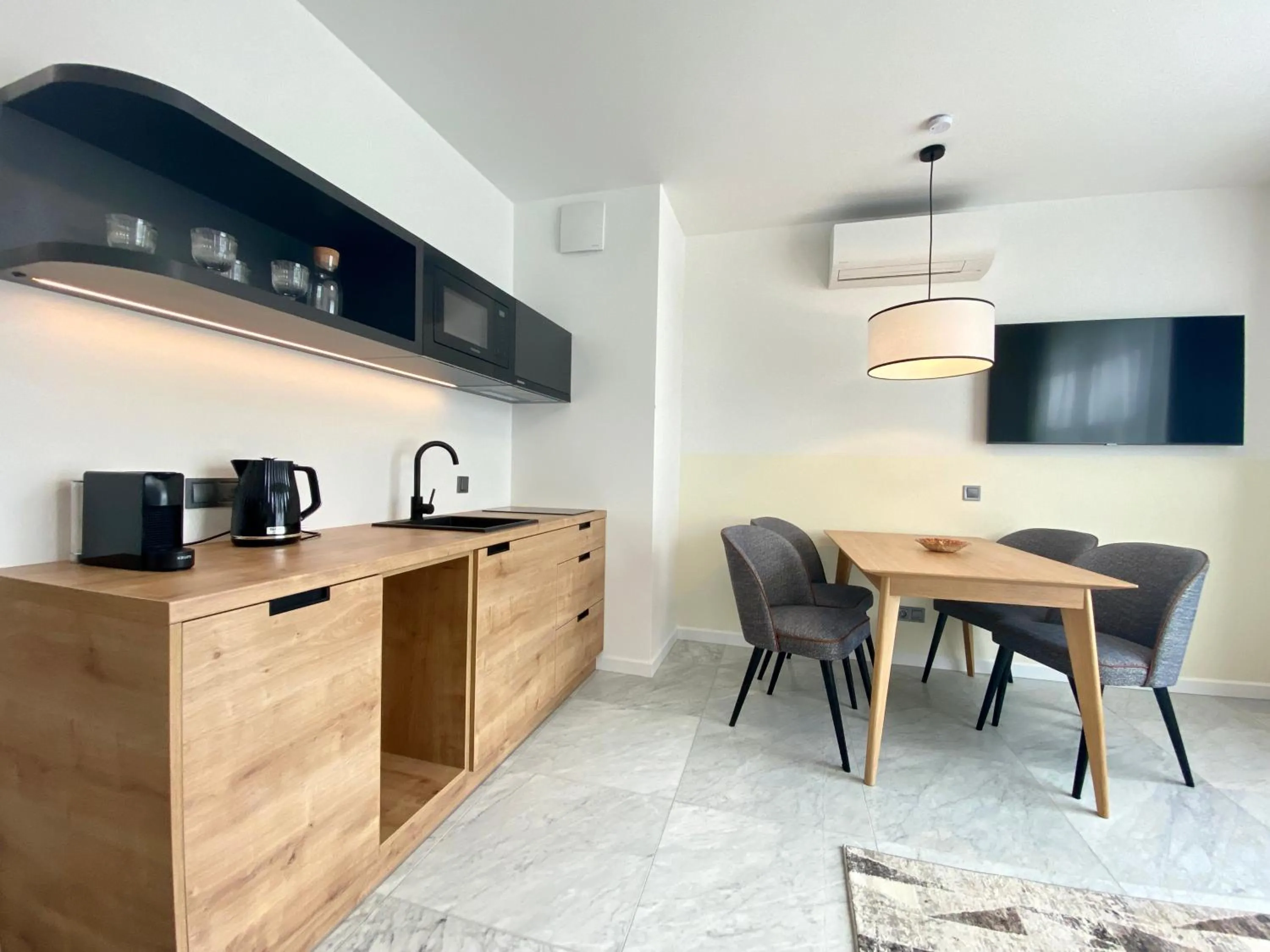 Kitchen or kitchenette in H11 Aparthotel