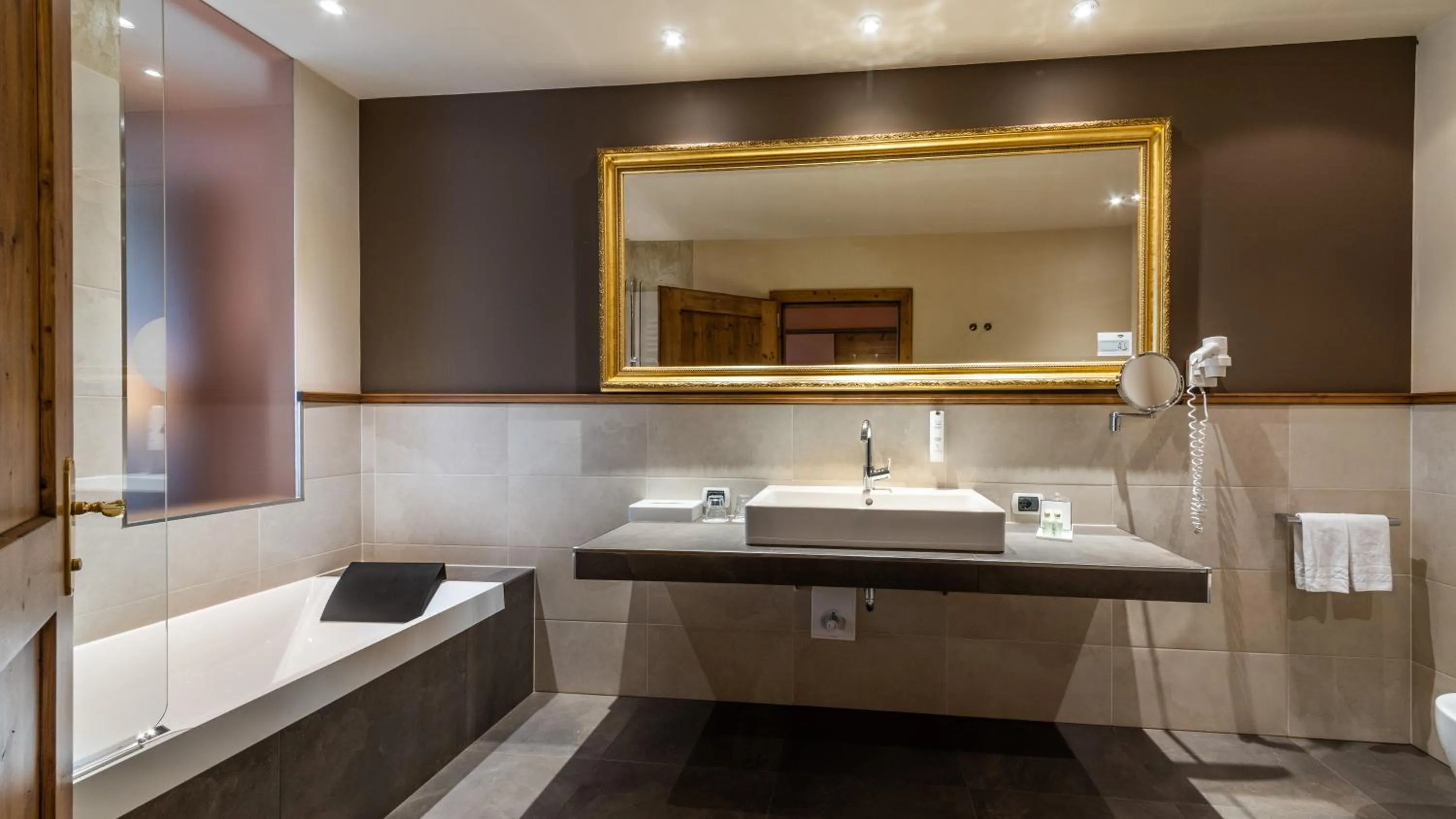 Bedroom in Romantik Hotel Santer