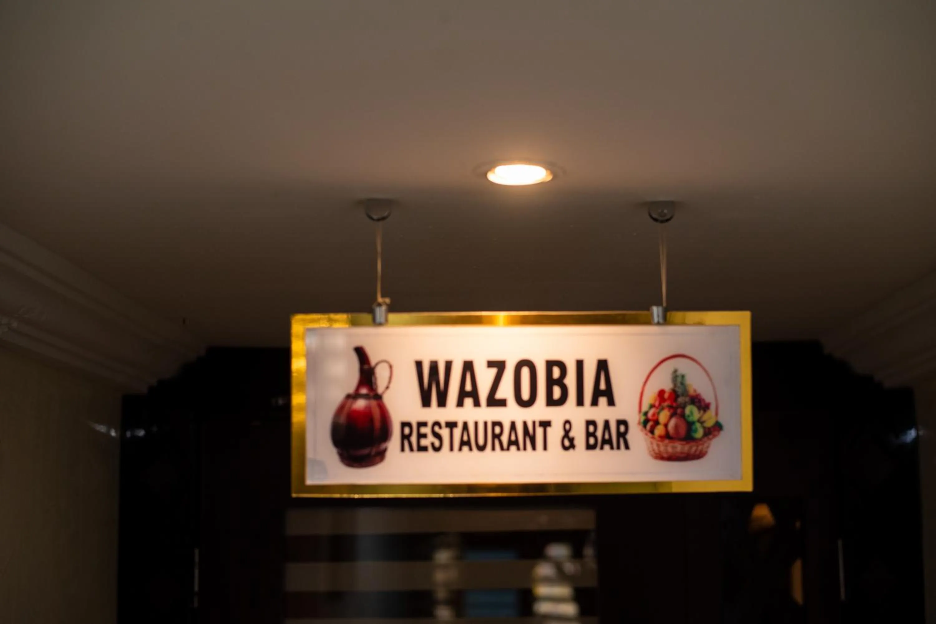 Property logo or sign in Golden Tulip Garden City Hotel - Rivotel