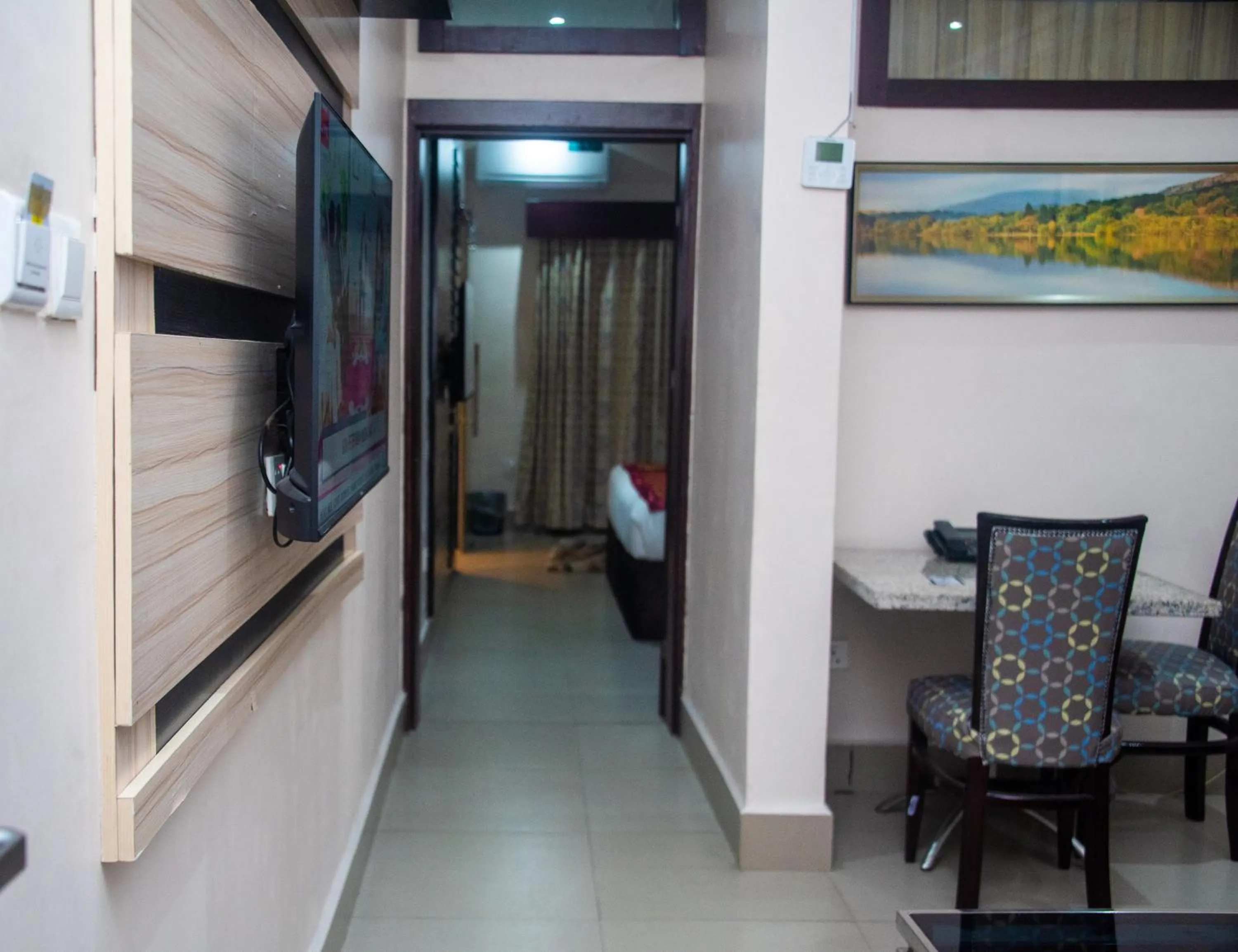 TV and multimedia in Golden Tulip Garden City Hotel - Rivotel