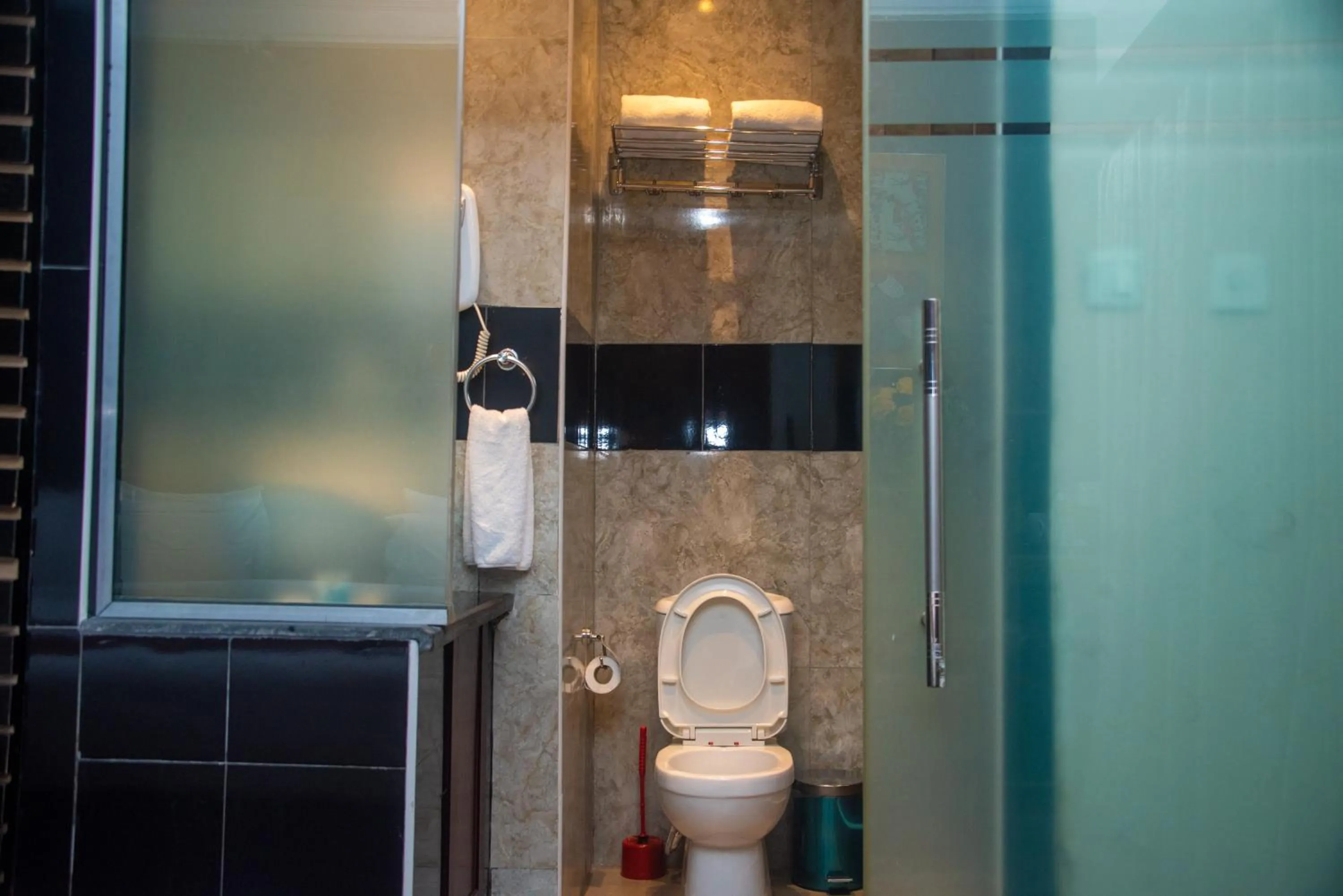 Shower in Golden Tulip Garden City Hotel - Rivotel