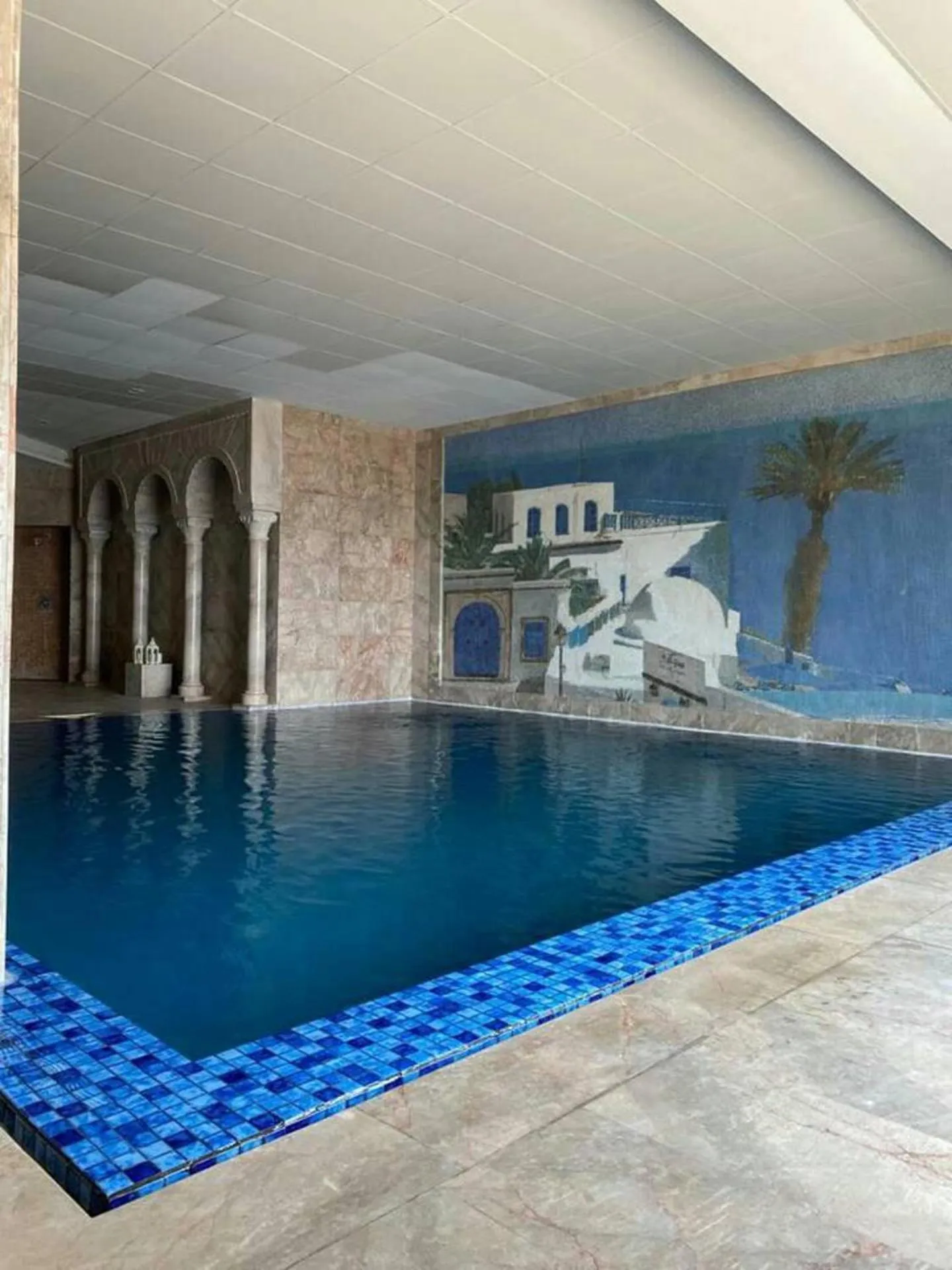 Swimming pool in Charming 1-Bed Apartment in Tunis close to centre