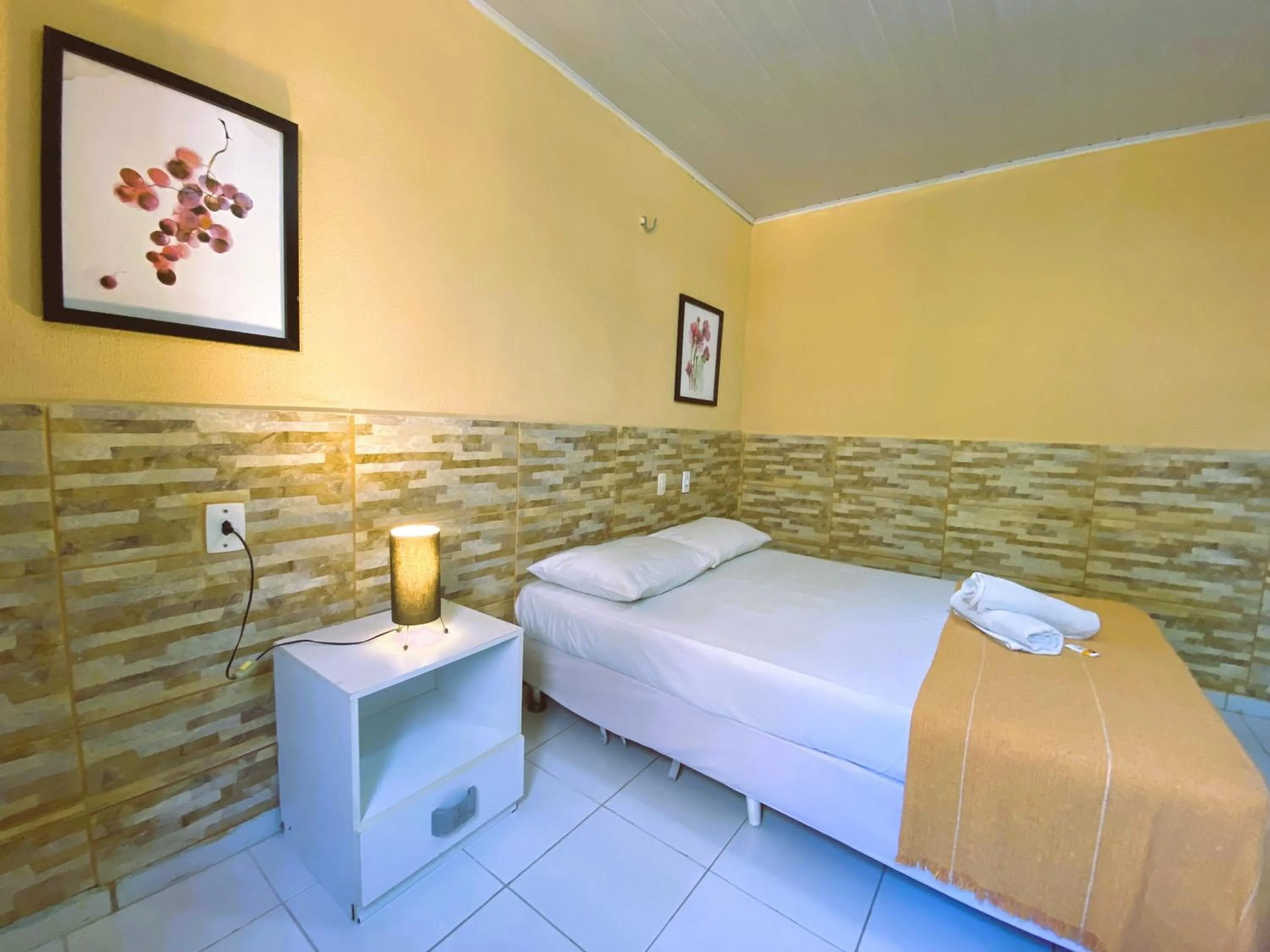 Bed in Pousada Hippopotamus Jeri