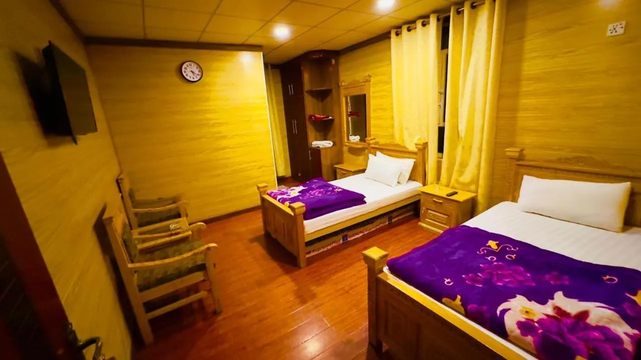 Bed in Gems Palace Hotel Sost