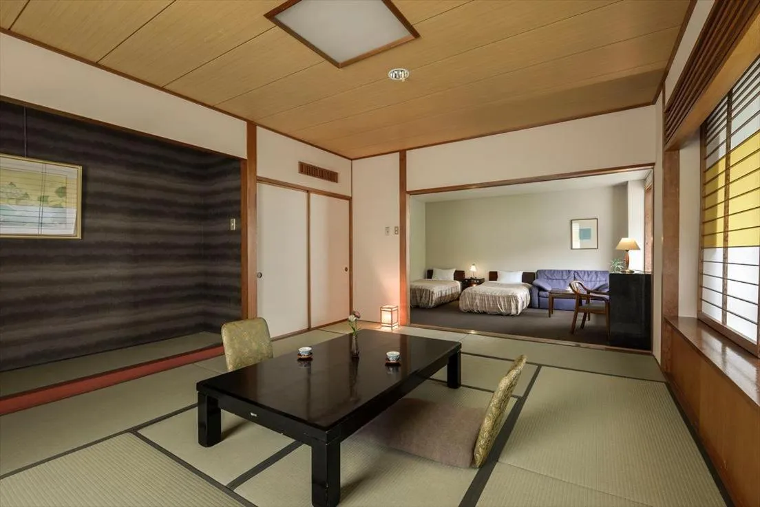 Living room, Bed in Takamiya Hotel Lucent