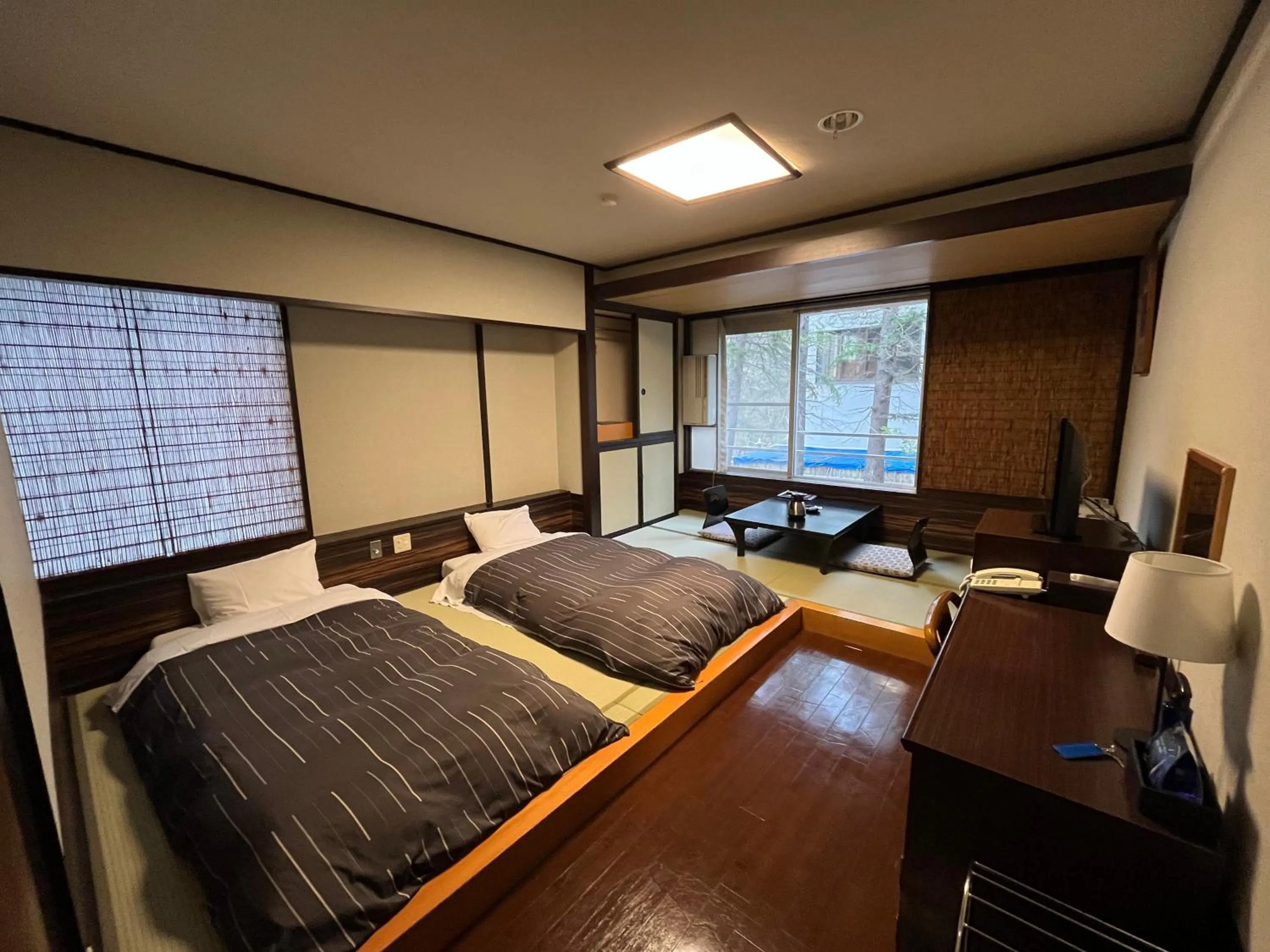 Bed in Takamiya Hotel Lucent