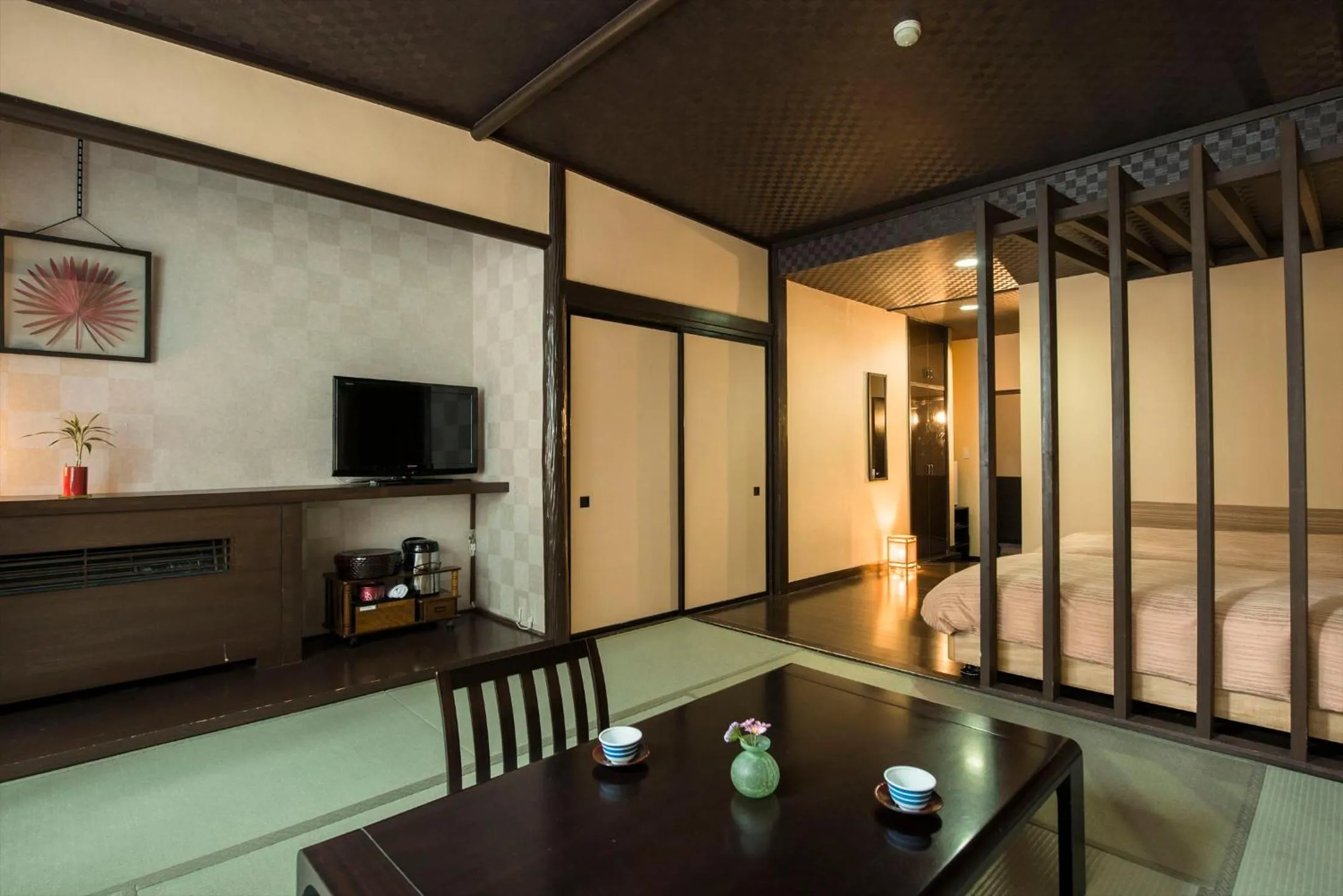 Bed in Takamiya Hotel Lucent