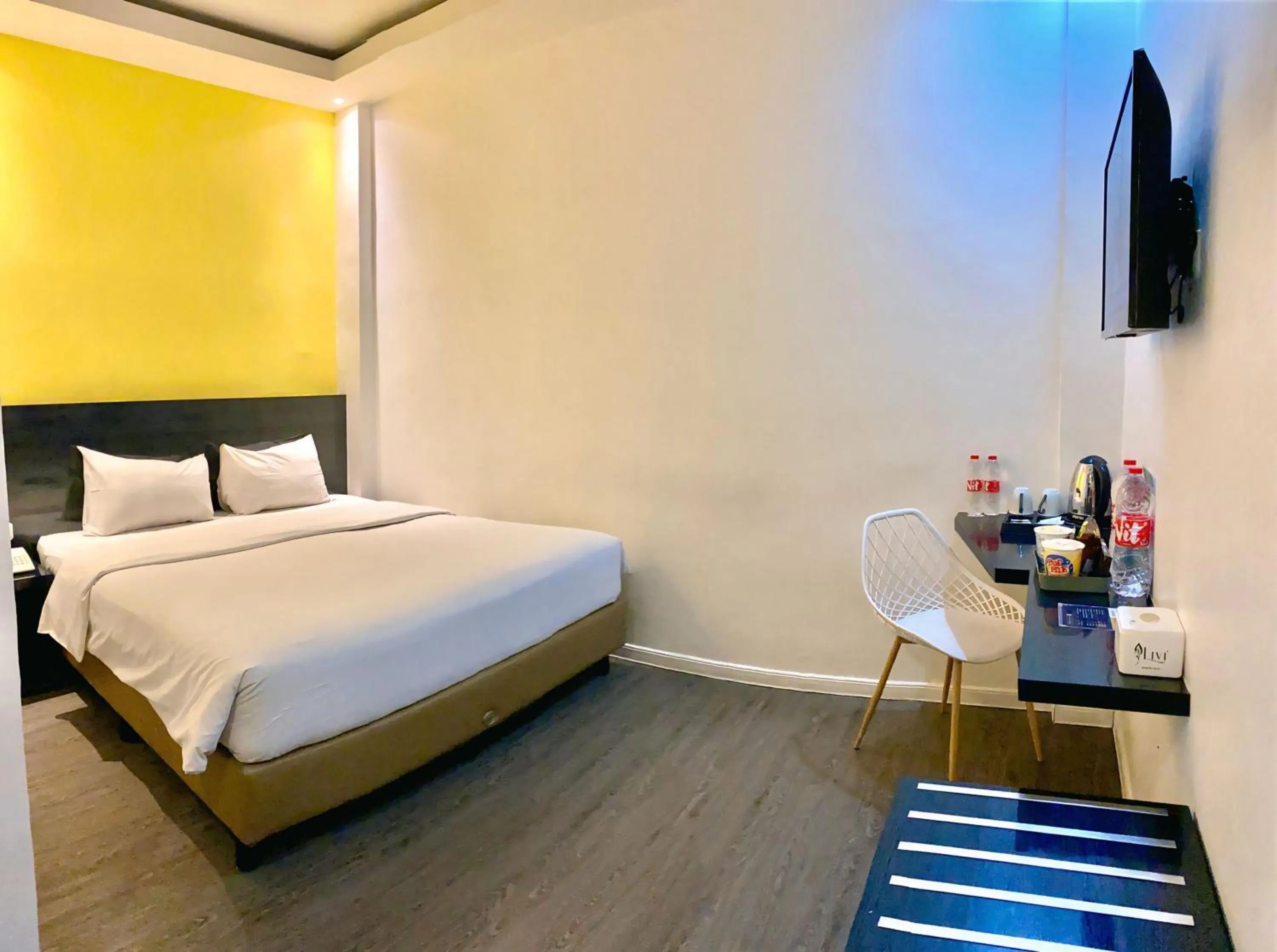 Bed in Rid's Hotel Palembang