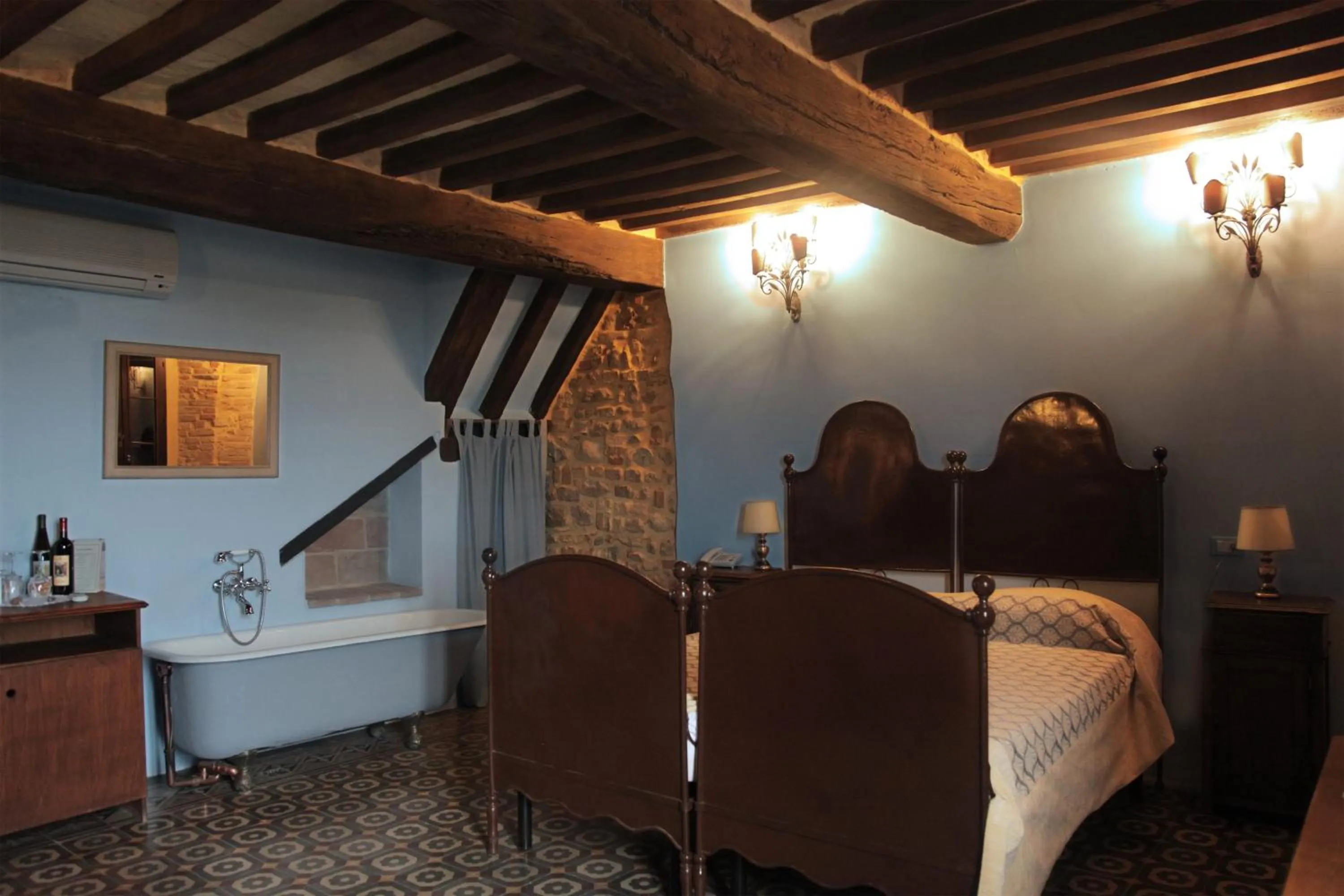 Photo of the whole room, Bed in Antico Borgo Di Tabiano Castello - Relais de Charme