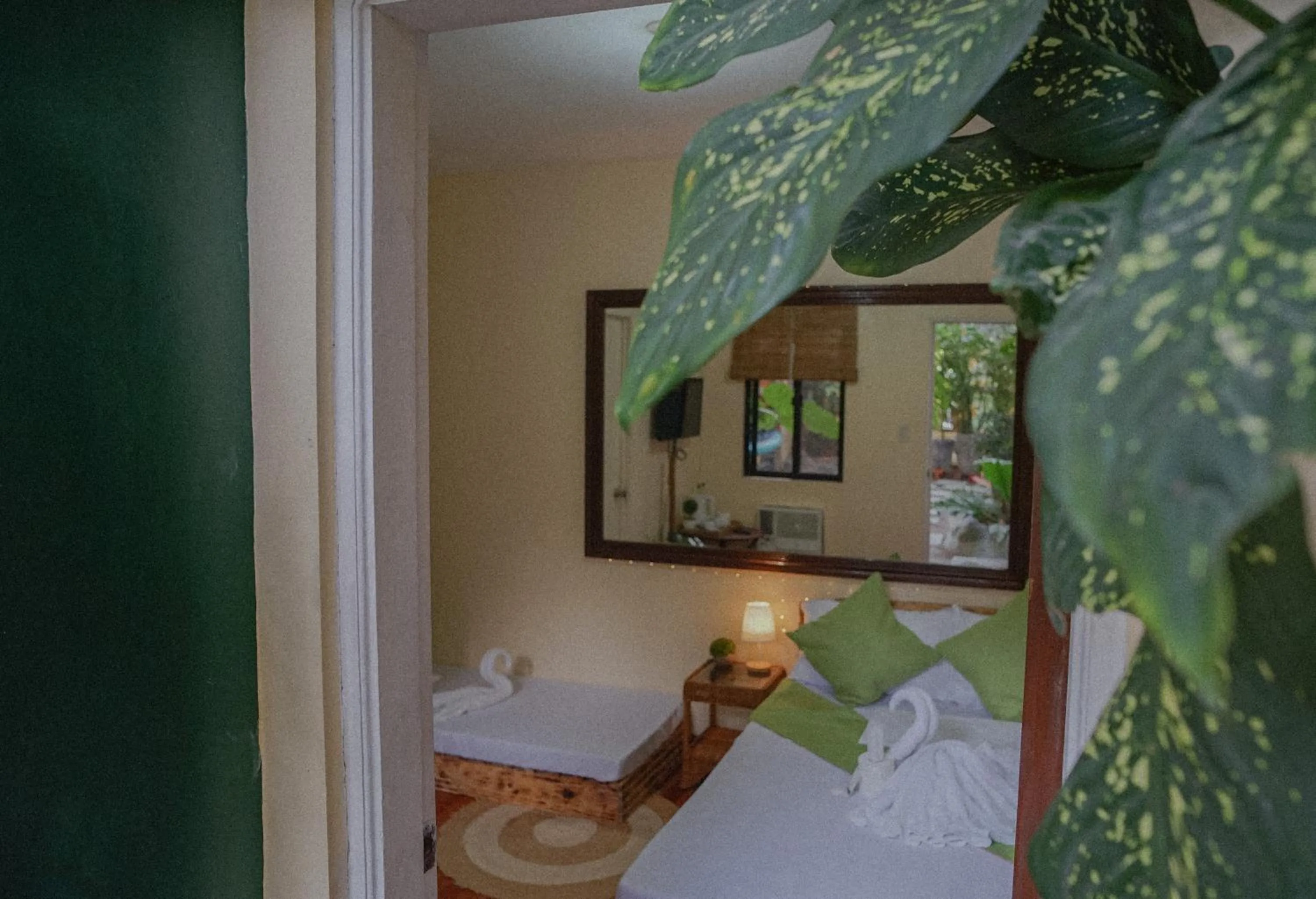 Bed in The Palms Resort & Bar