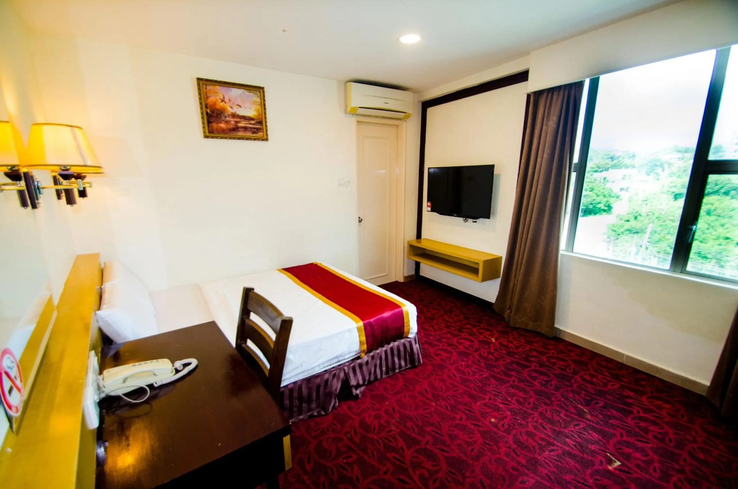 Photo of the whole room, Bed in GRAND EASTERN HOTEL SDN BHD