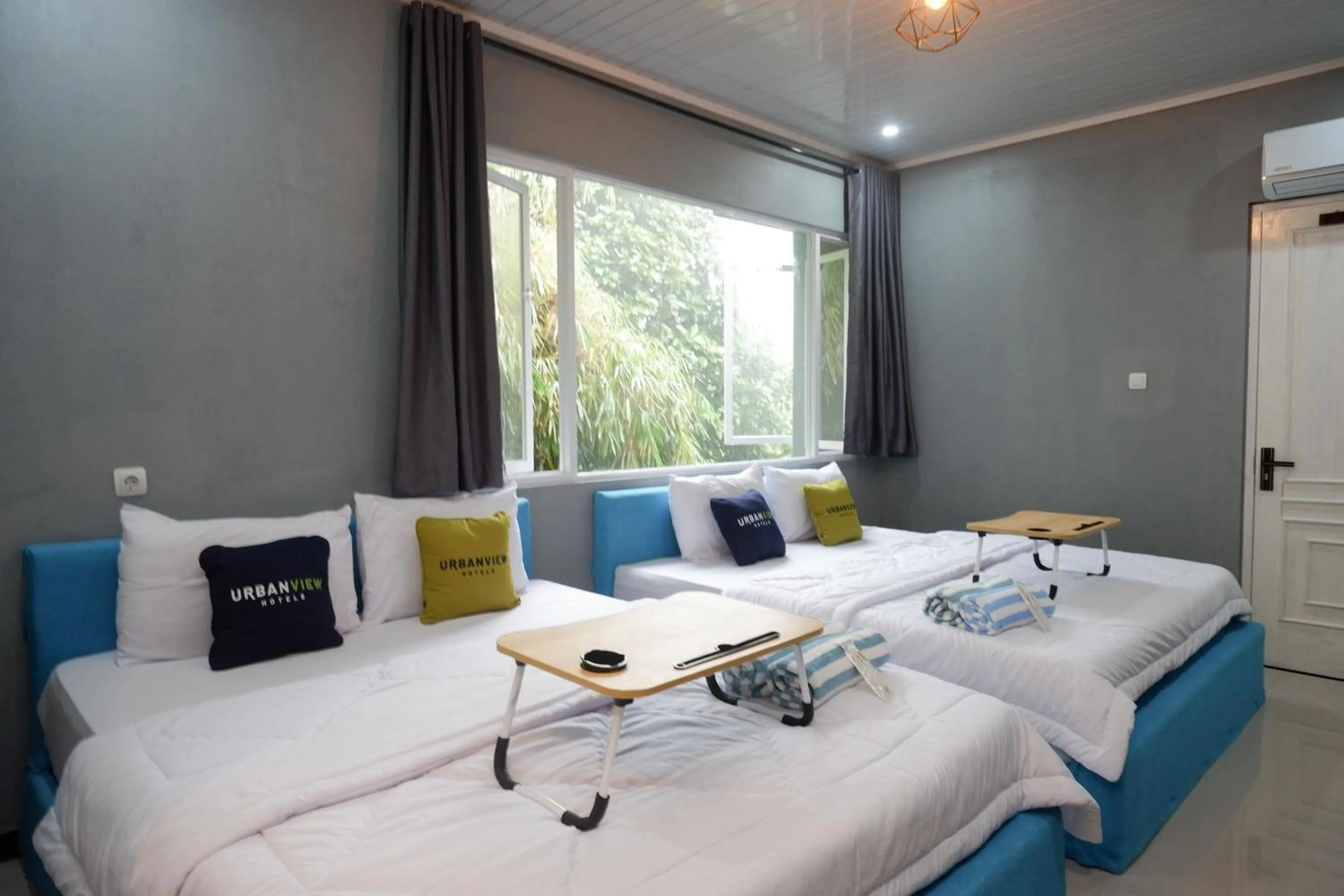 Bedroom, Bed in Urbanview Hotel Umbrella Dieng by RedDoorz