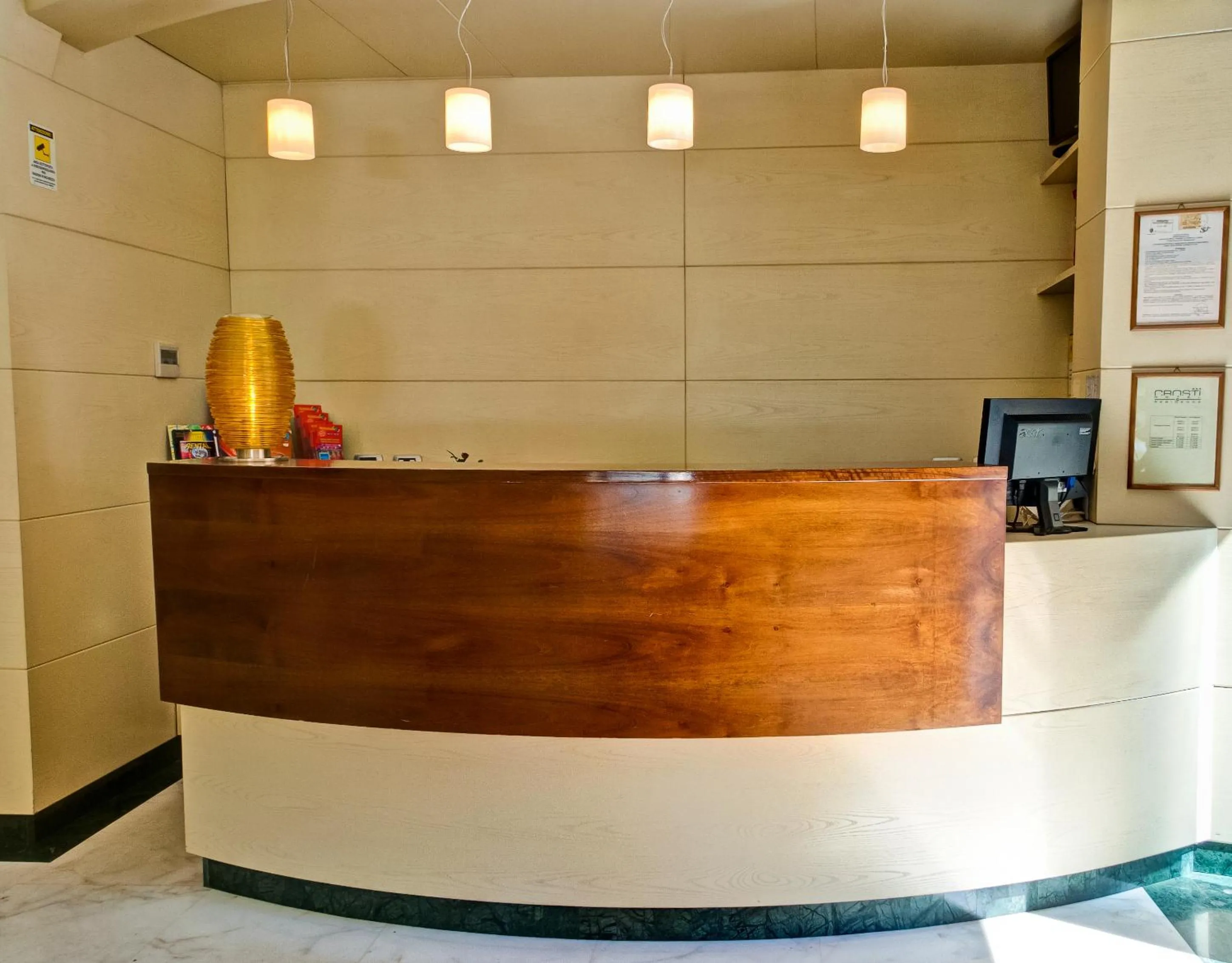 Lobby or reception in Crosti Hotel