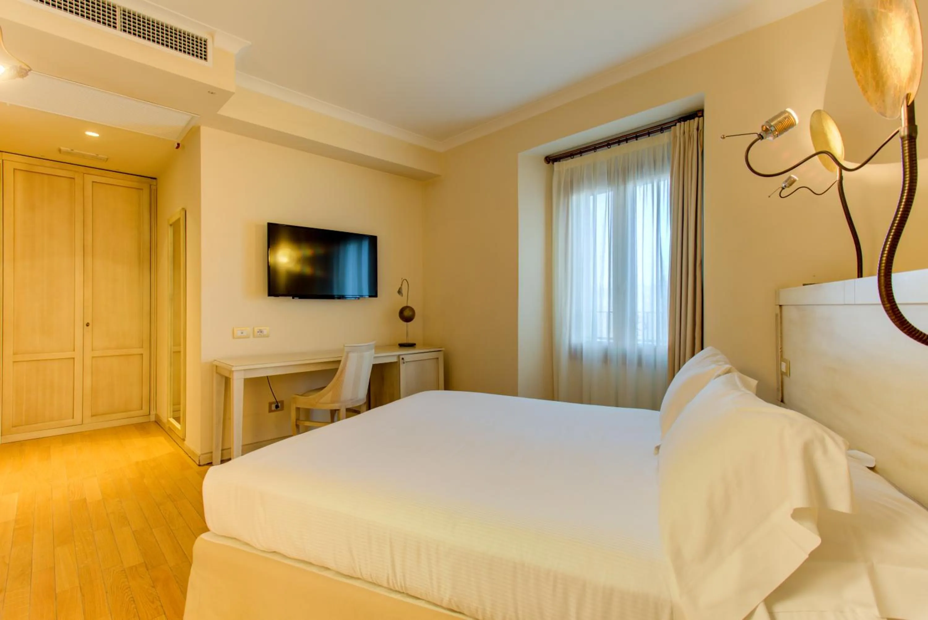 Bedroom, Bed in Oste del Castello Wellness & Bike Hotel