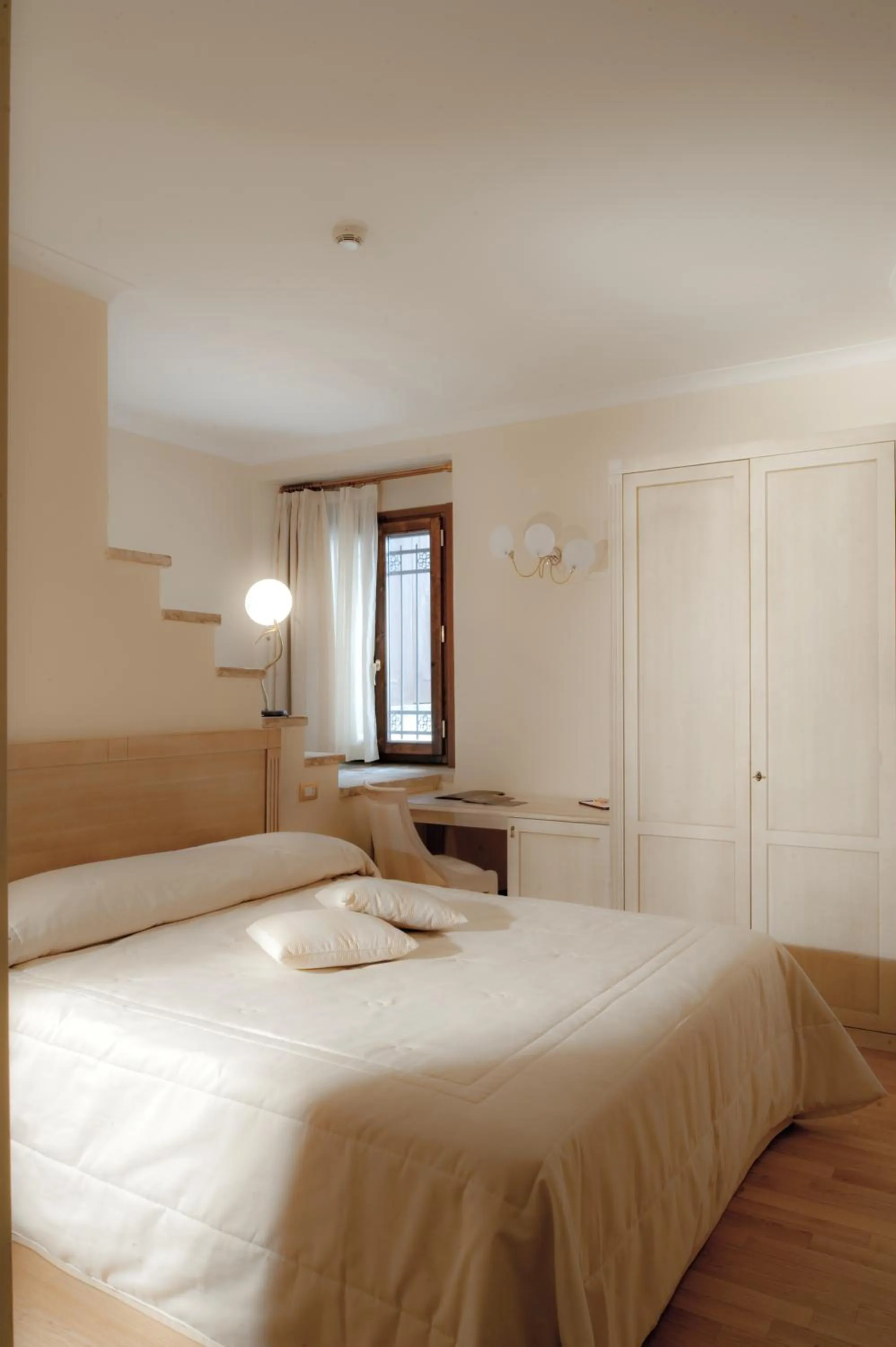 Bedroom, Bed in Oste del Castello Wellness & Bike Hotel