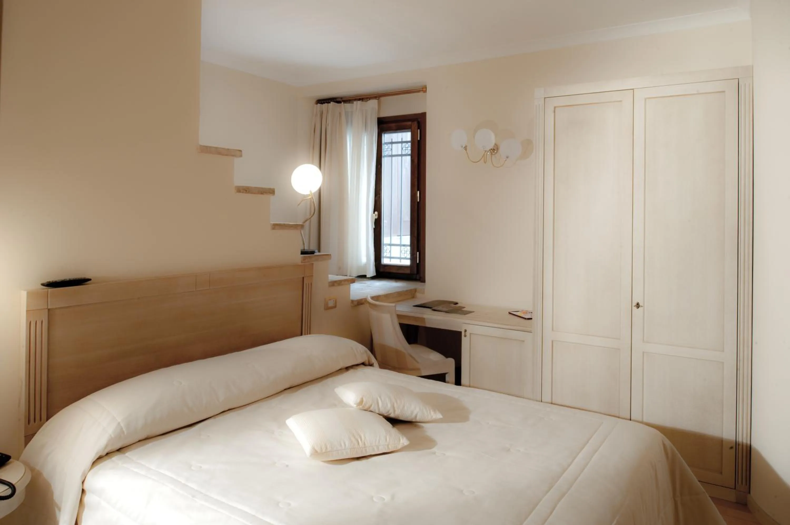 Bedroom, Bed in Oste del Castello Wellness & Bike Hotel