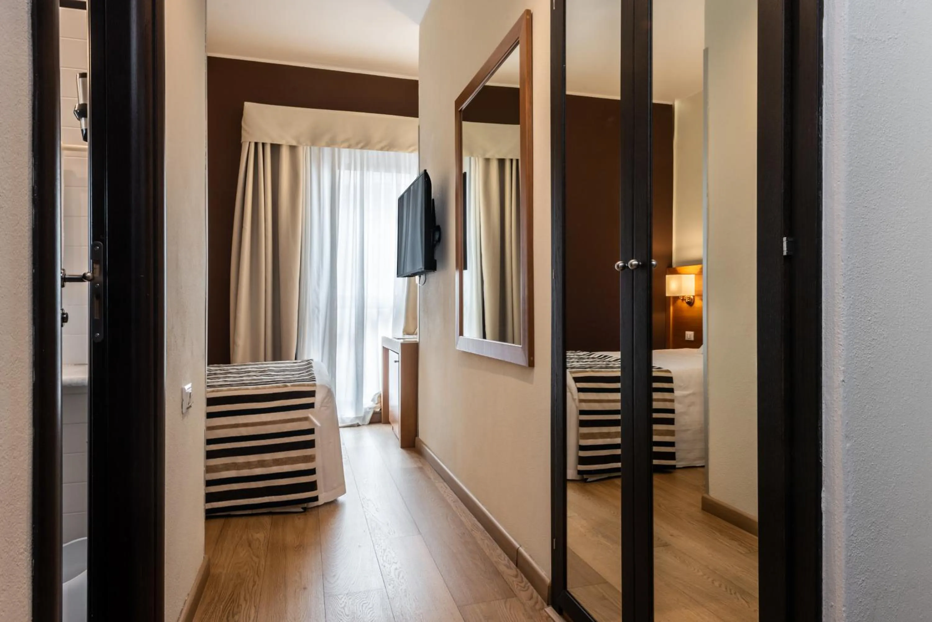 Bedroom, Bed in Sardegna Hotel - Suites & Restaurant