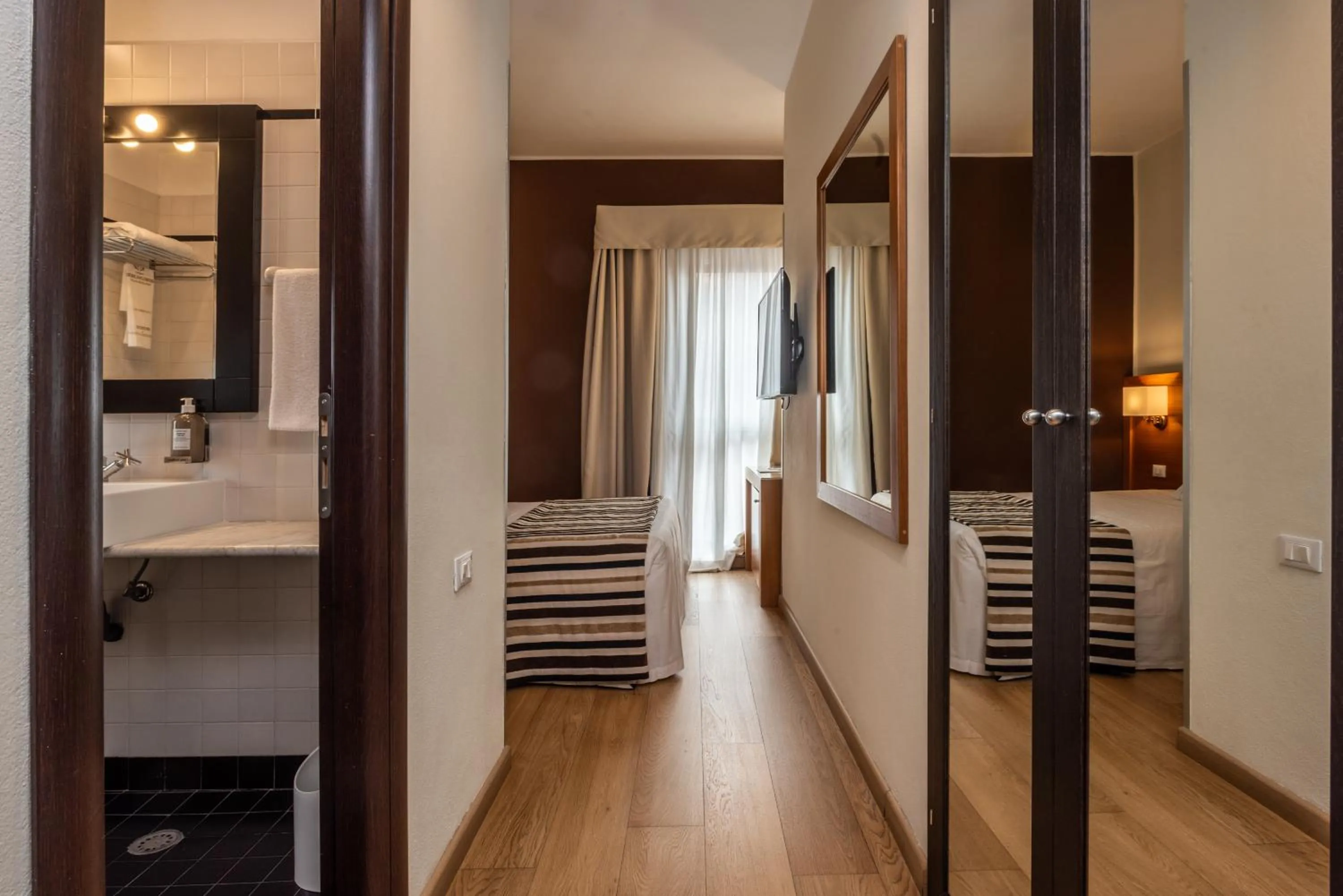 Bathroom in Sardegna Hotel - Suites & Restaurant