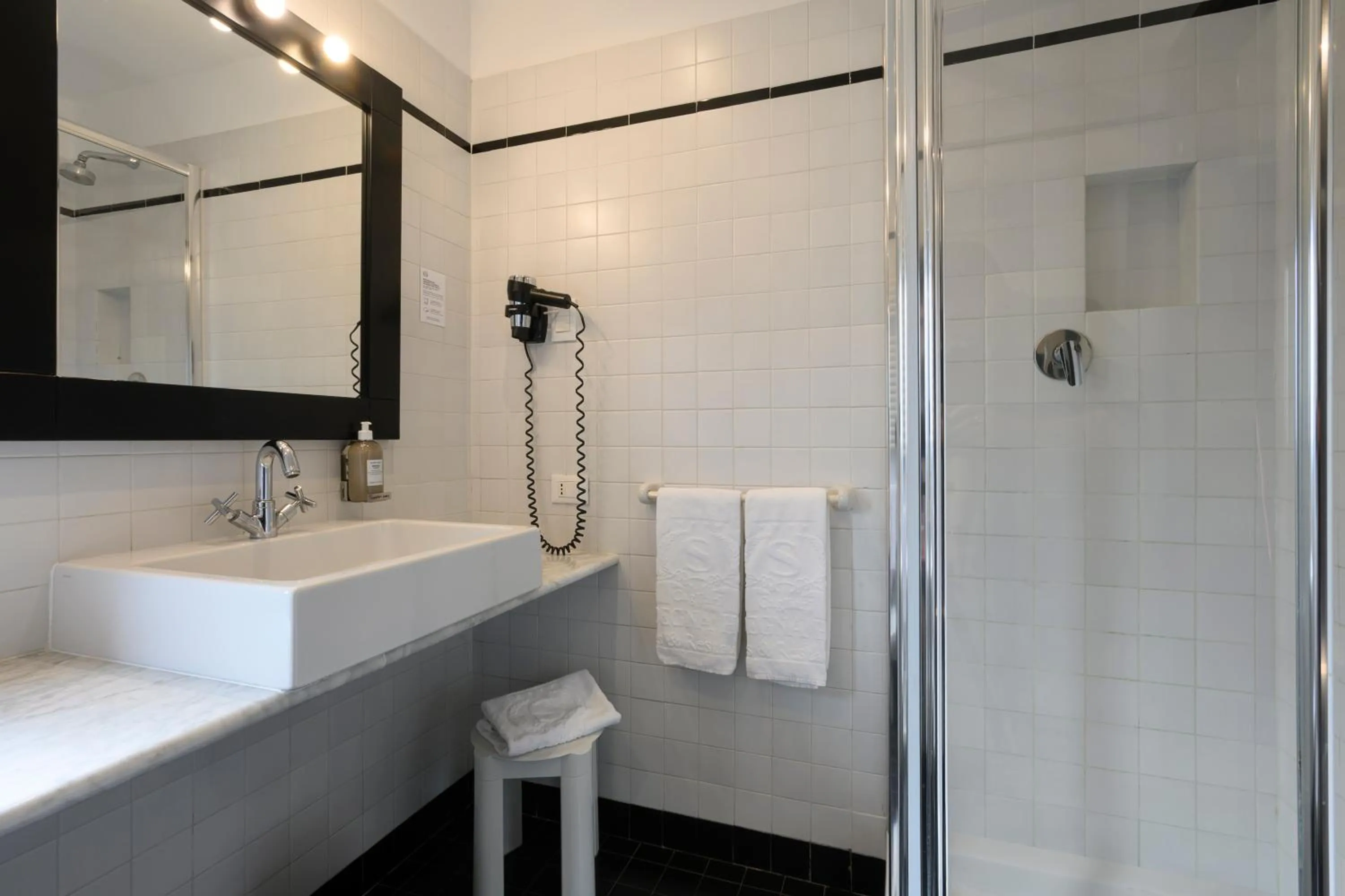 Shower in Sardegna Hotel - Suites & Restaurant