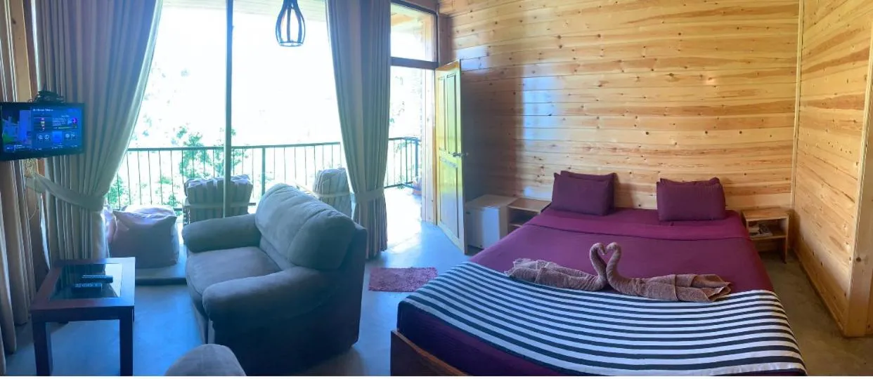 Communal lounge/ TV room, Bed in Country Homes