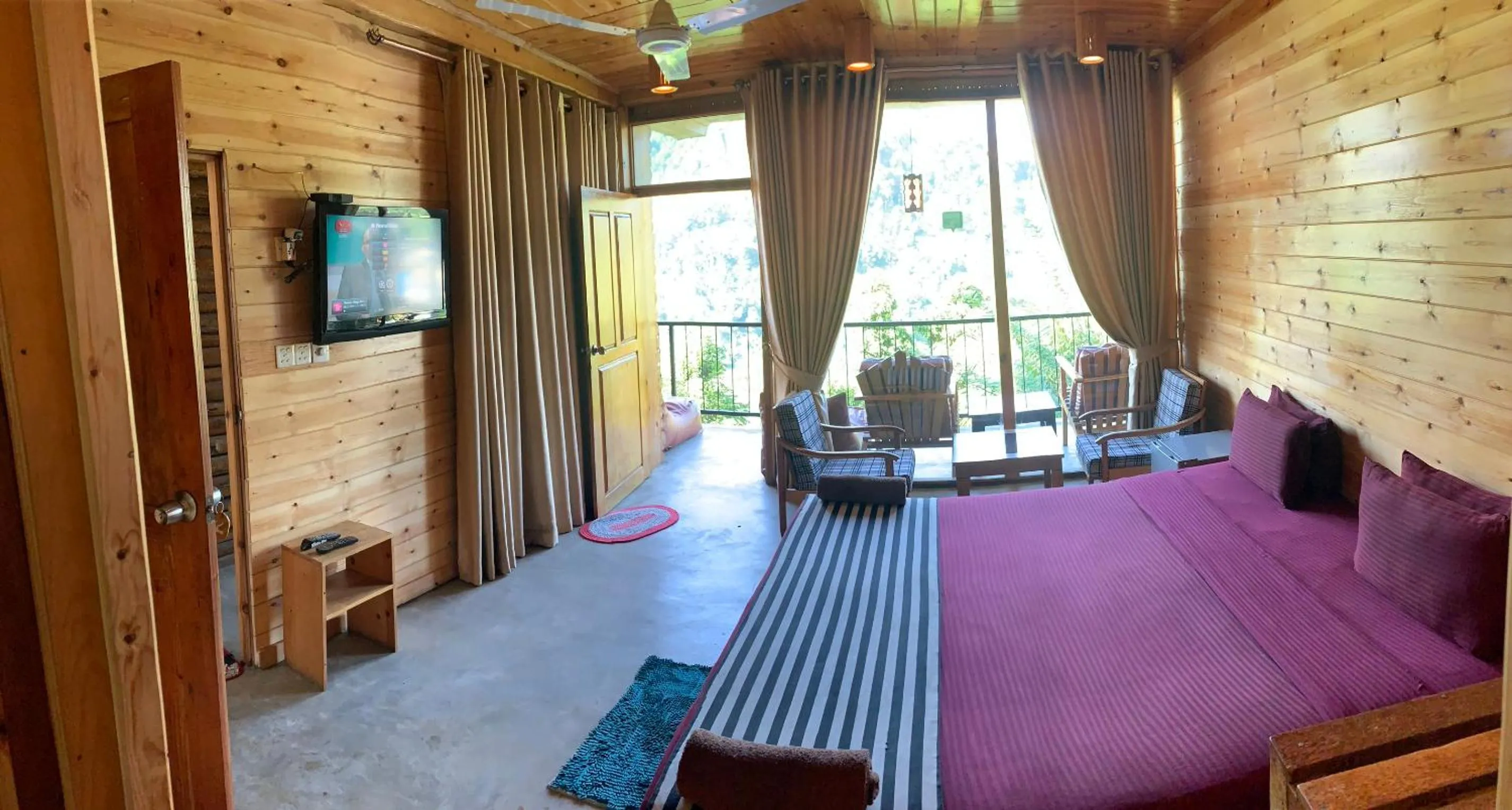 Communal lounge/ TV room, Bed in Country Homes