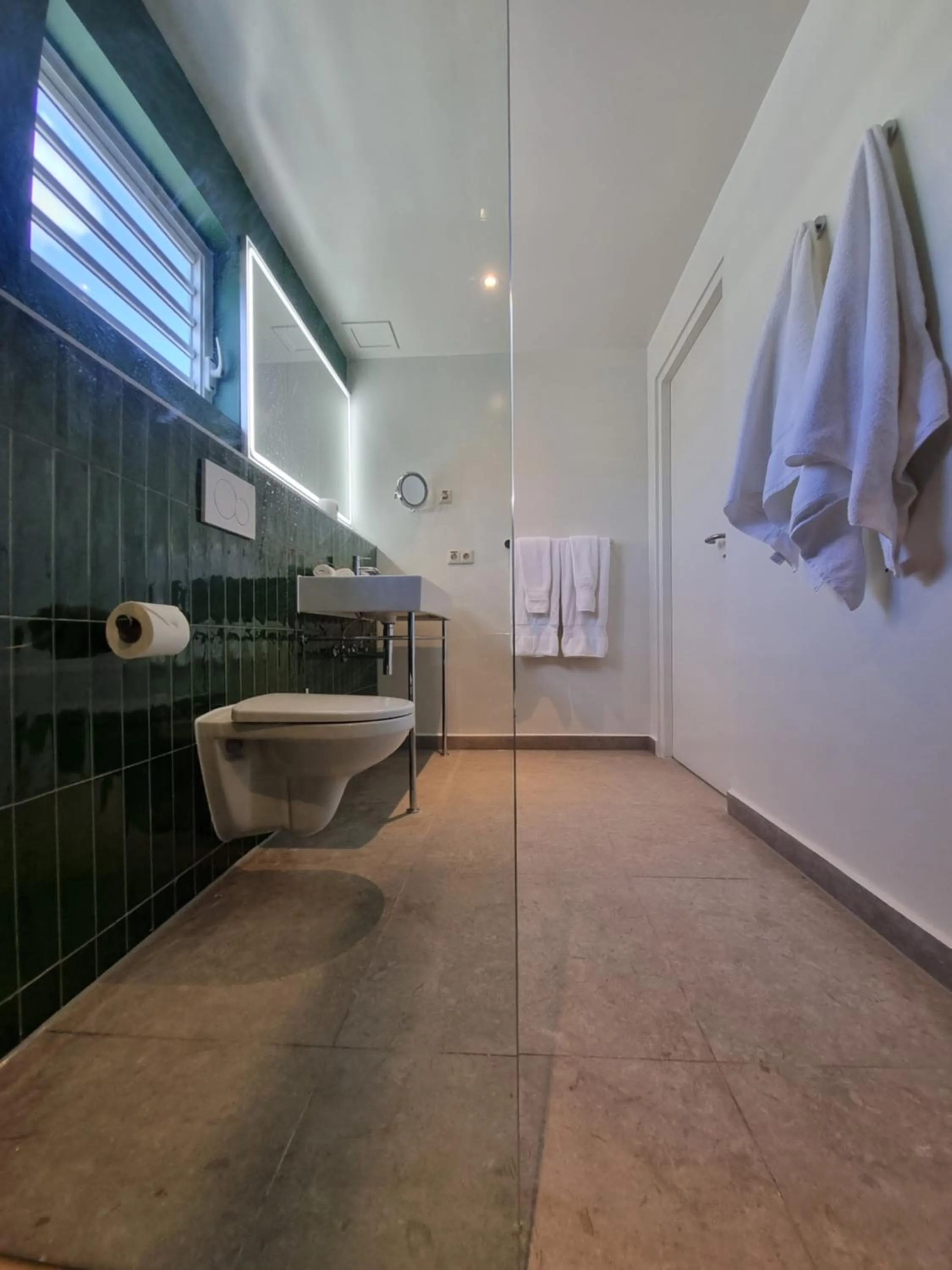 Bathroom in Kura Botanica Hotel