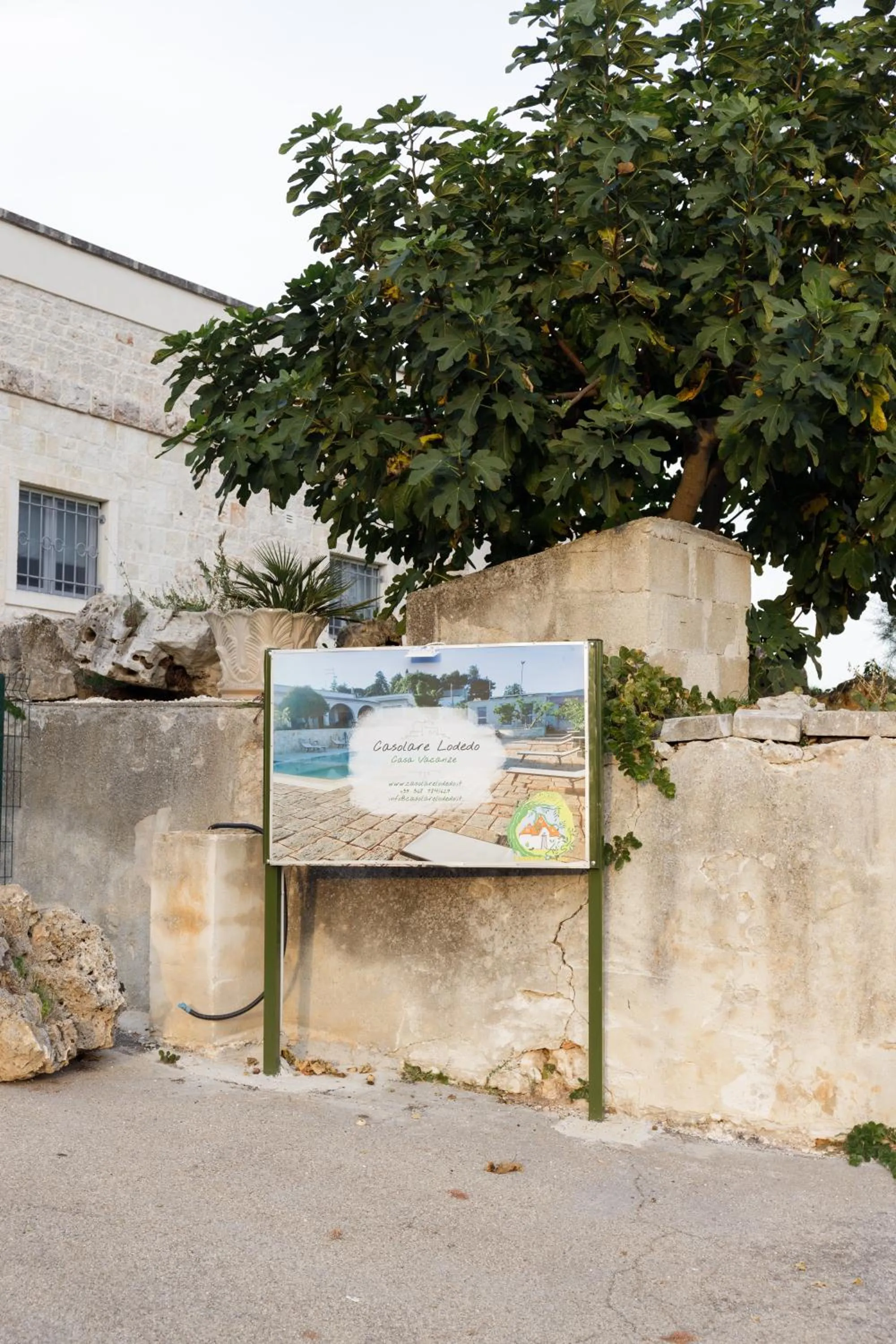 Property logo or sign in Casolare Lodedo