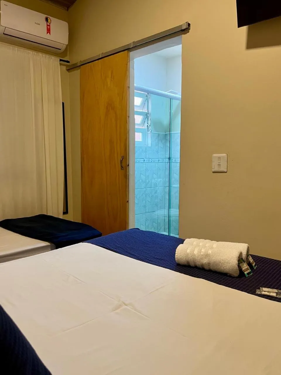 Bed in Pousada Casa Rosada Ilhabela