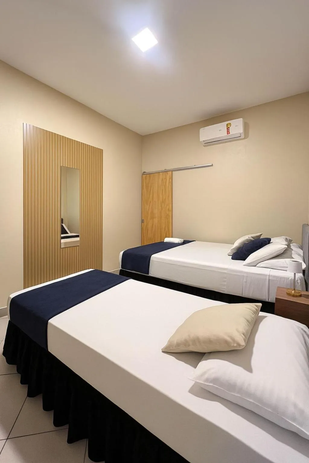 Bed in Pousada Casa Rosada Ilhabela