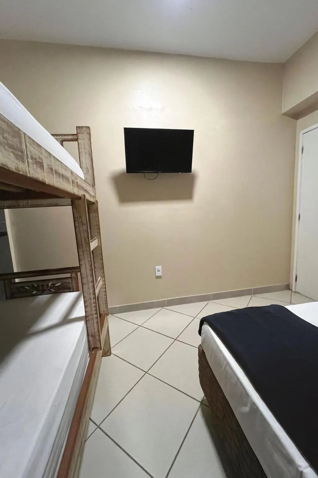 Bed in Pousada Casa Rosada Ilhabela