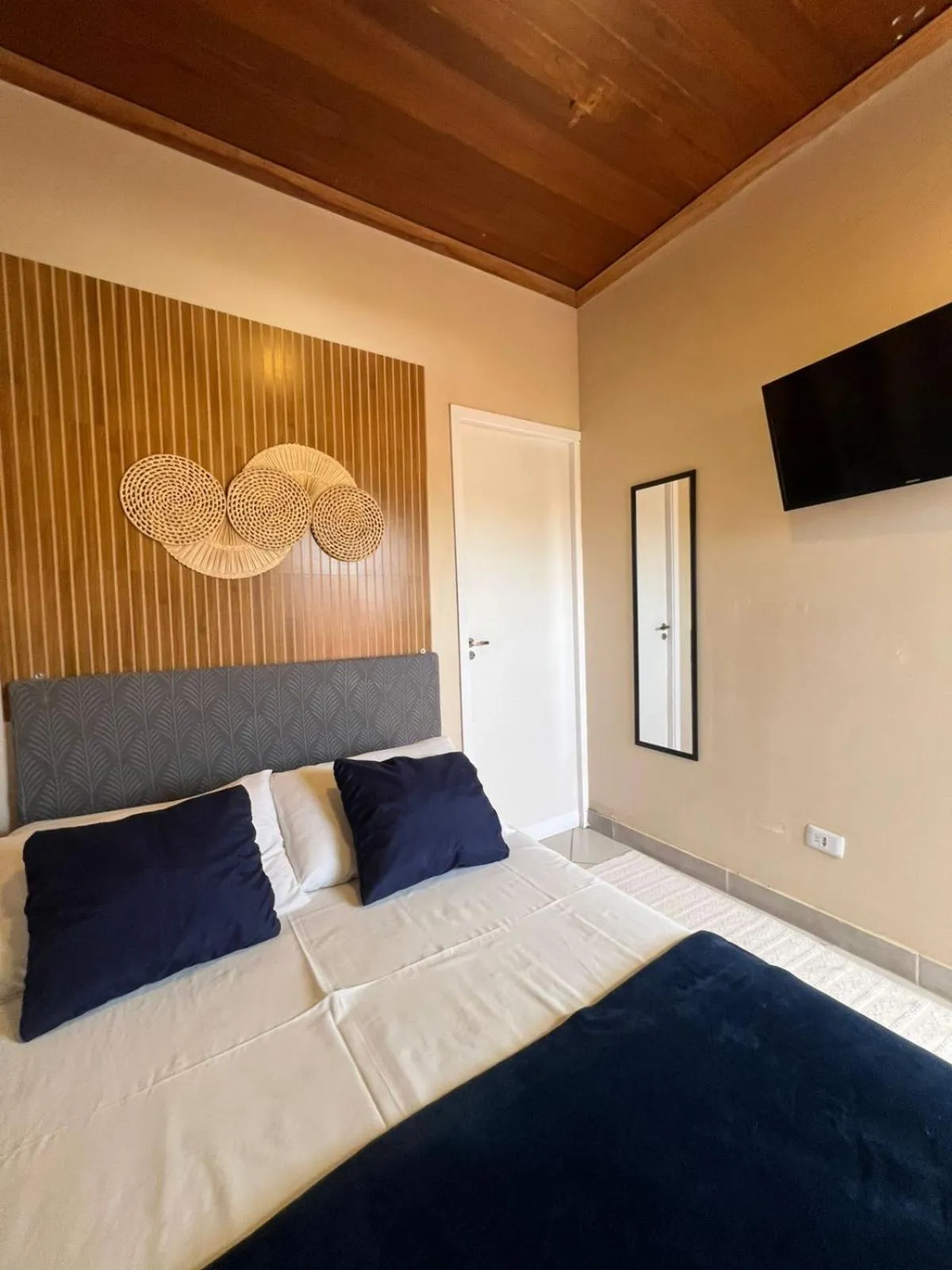 Bed in Pousada Casa Rosada Ilhabela