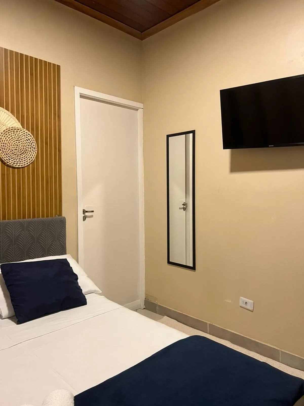 Bed in Pousada Casa Rosada Ilhabela