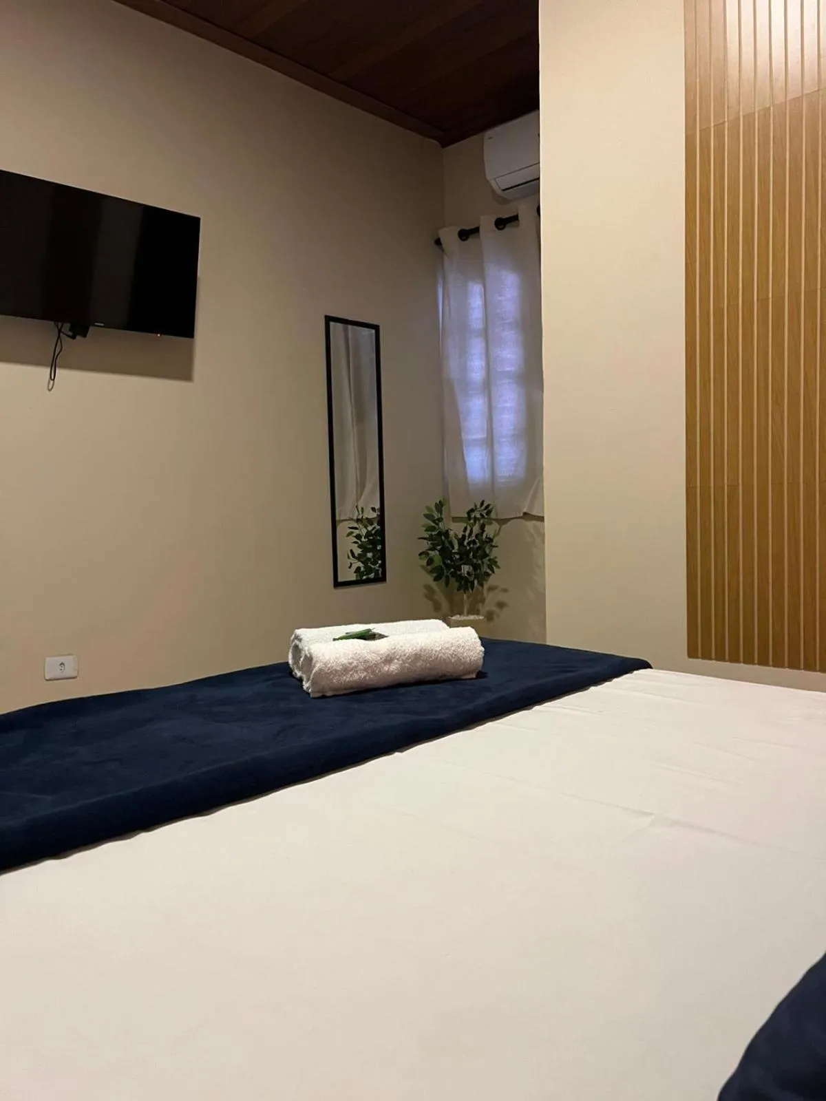 Bed in Pousada Casa Rosada Ilhabela