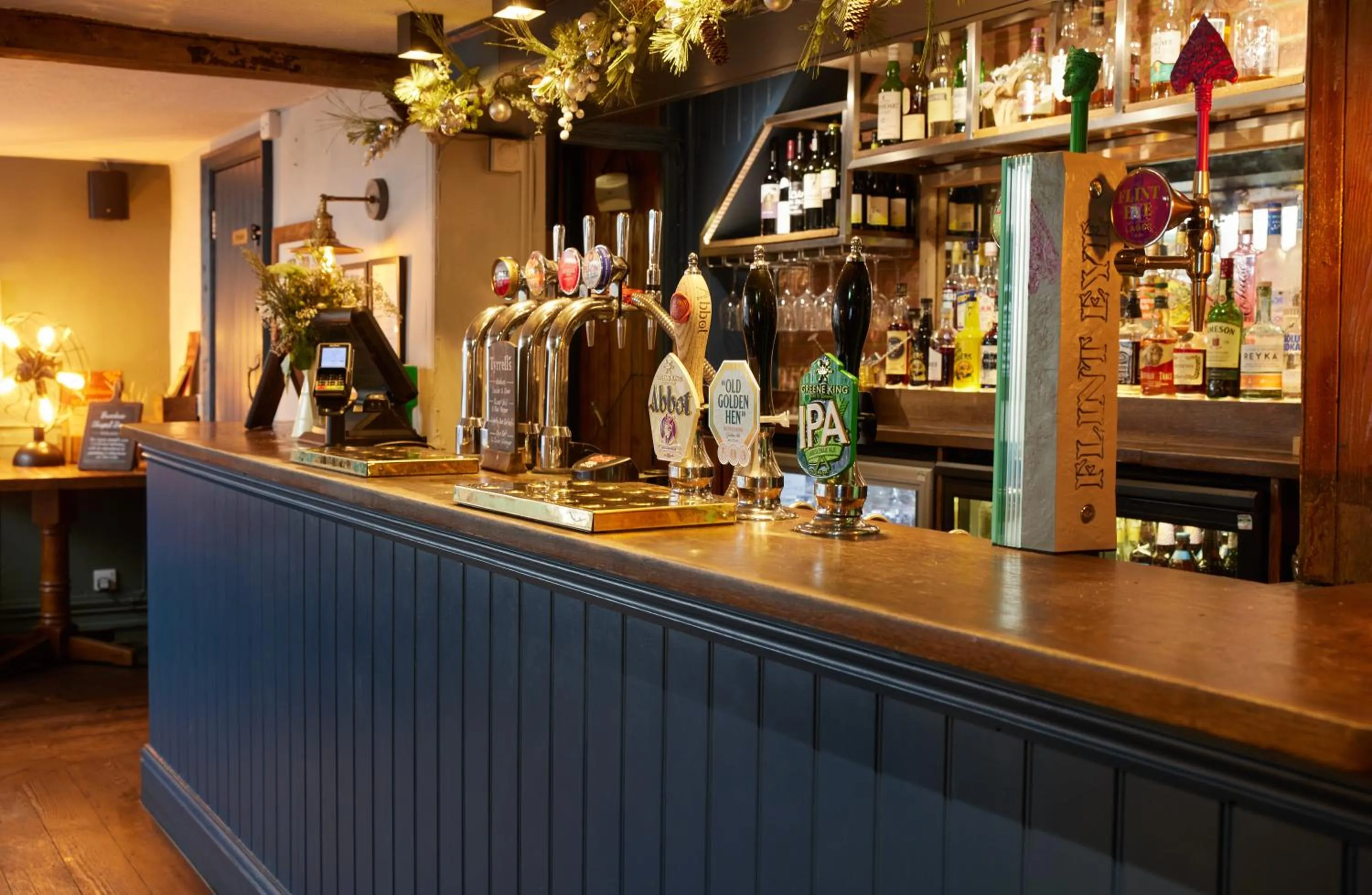 Lounge or bar in Dog and Partridge by Greene King Inns