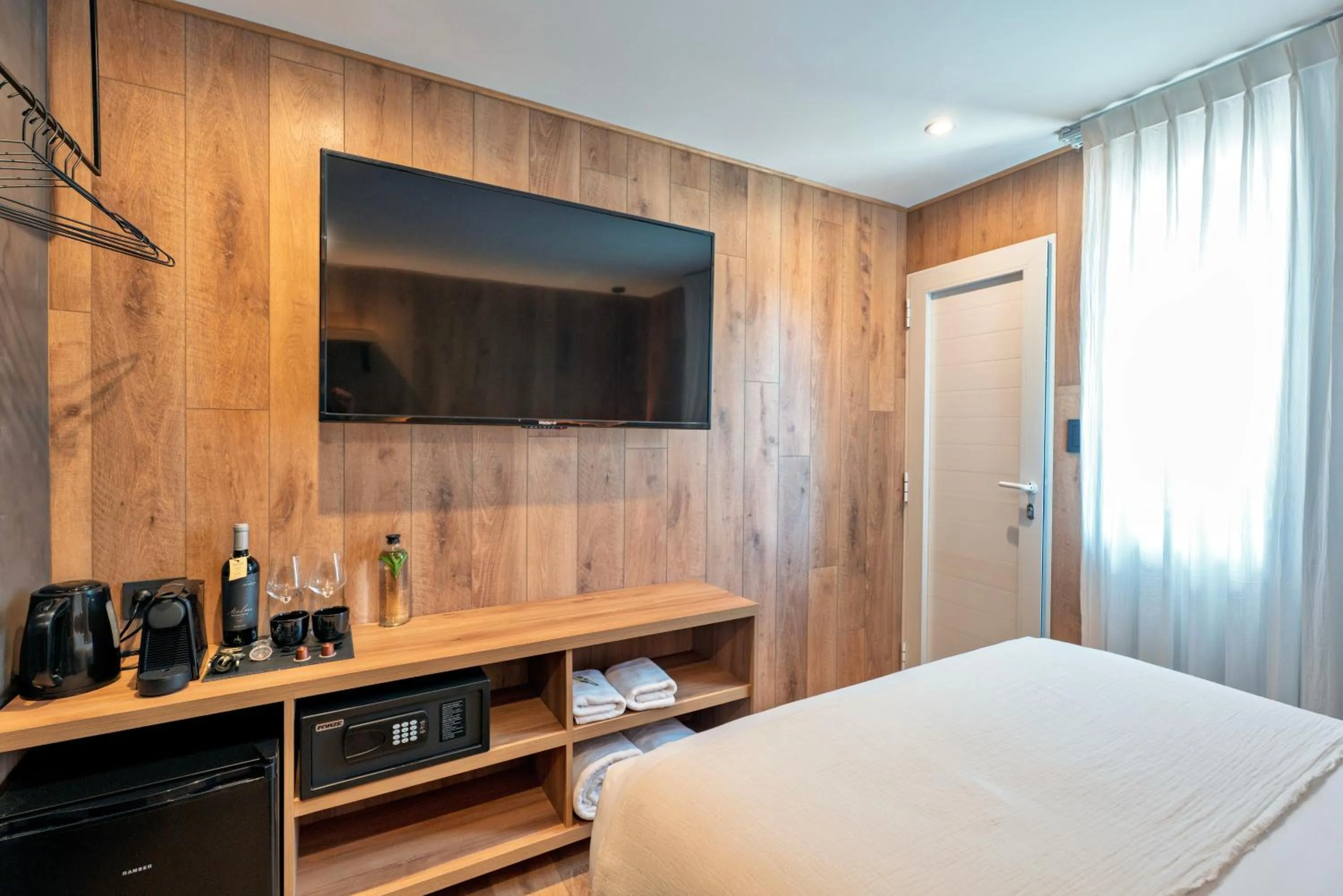 Bed in Montano Boutique Suites