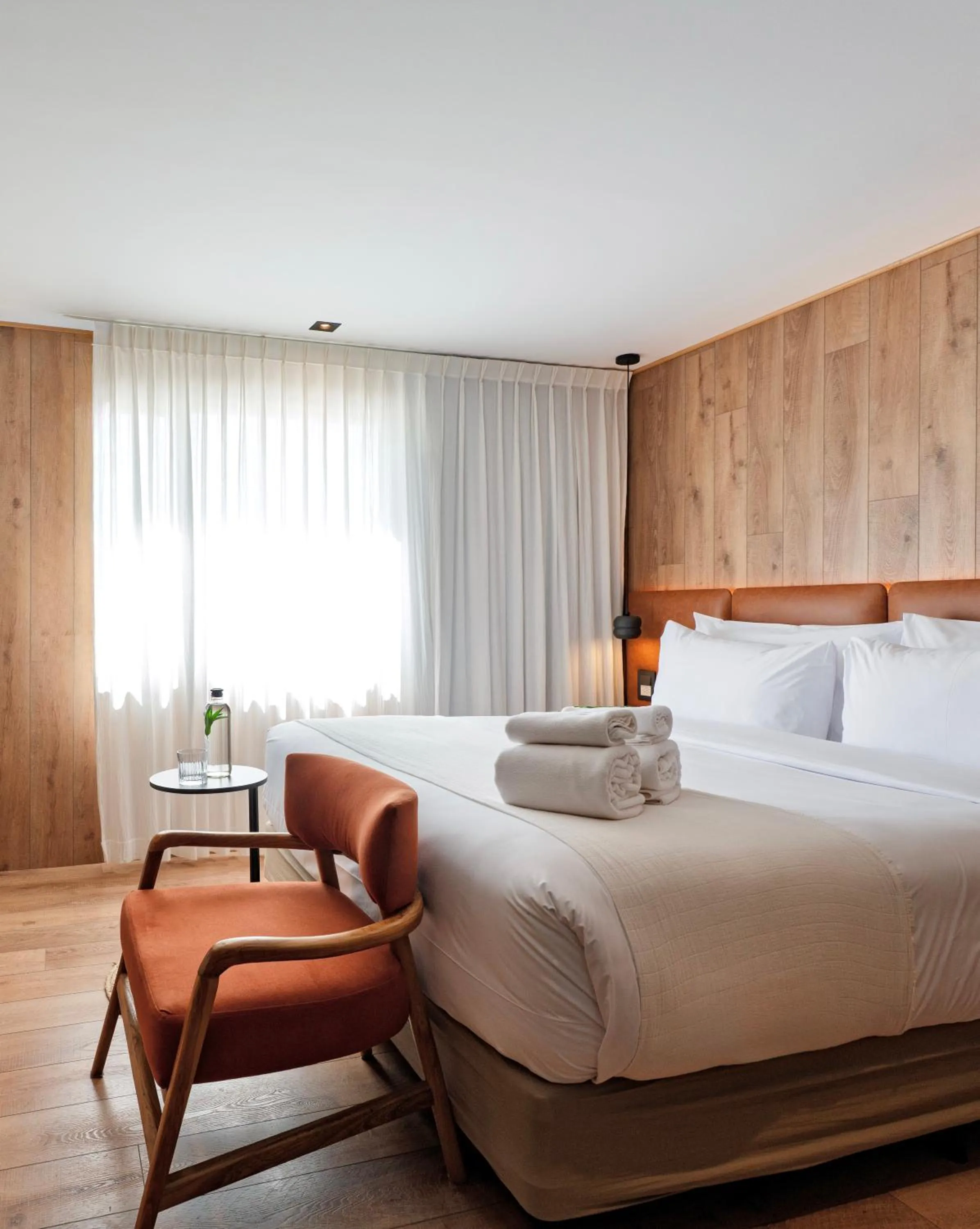 Bed in Montano Boutique Suites