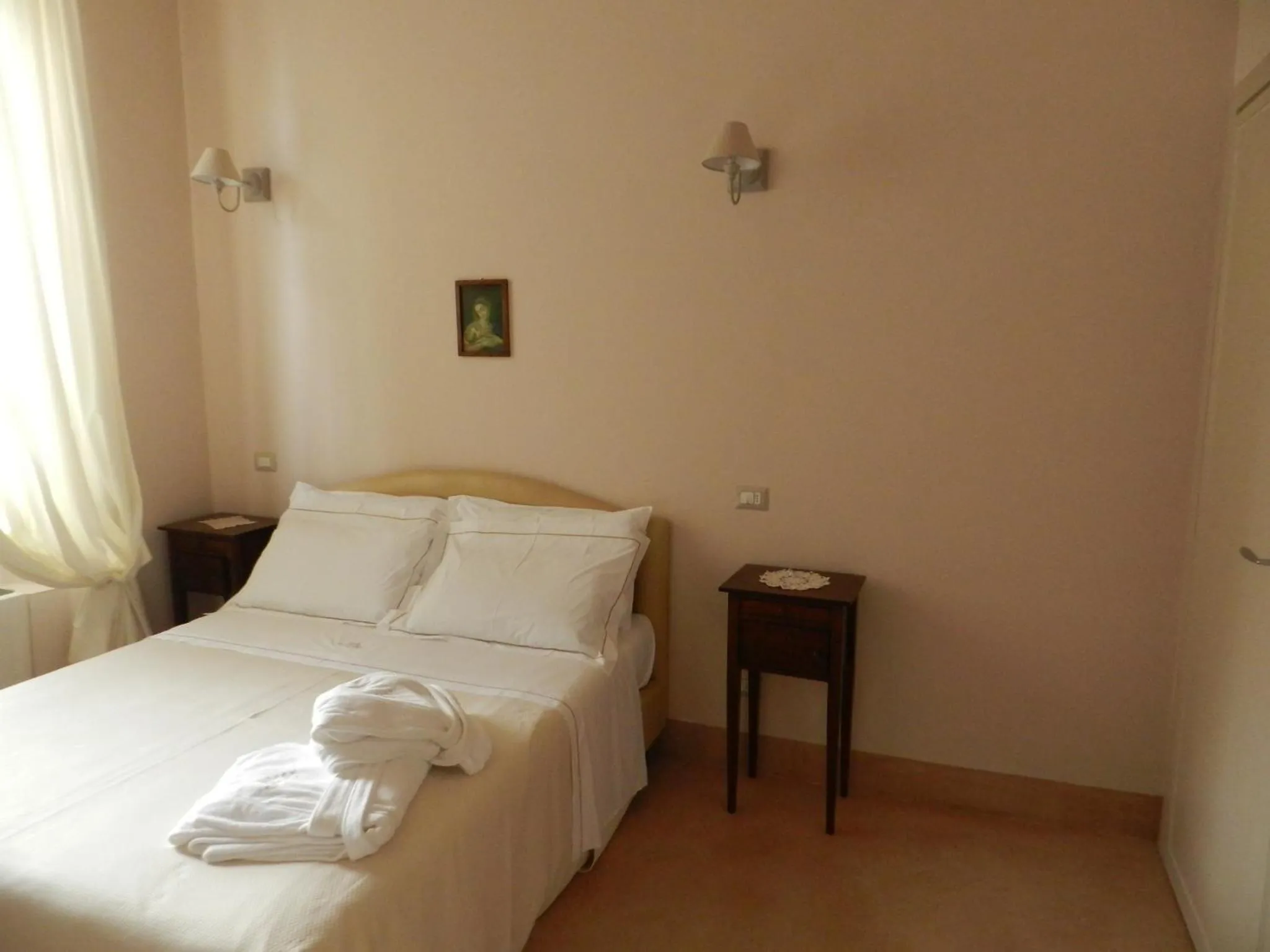 Bed in Relais Real Collegio