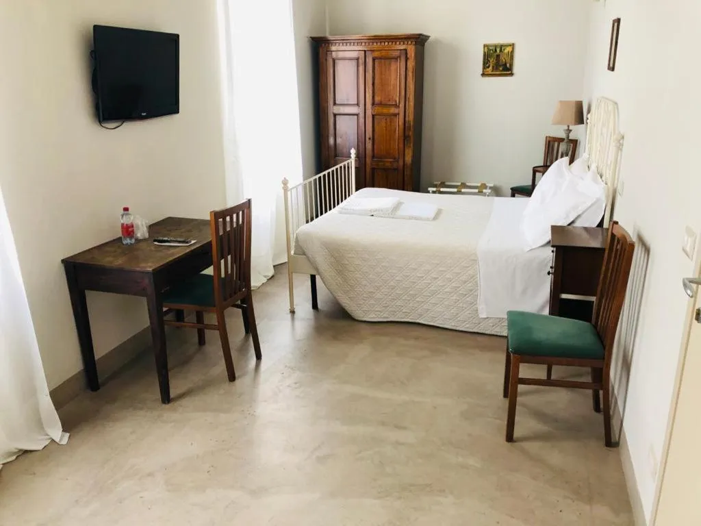 Bedroom in Relais Real Collegio