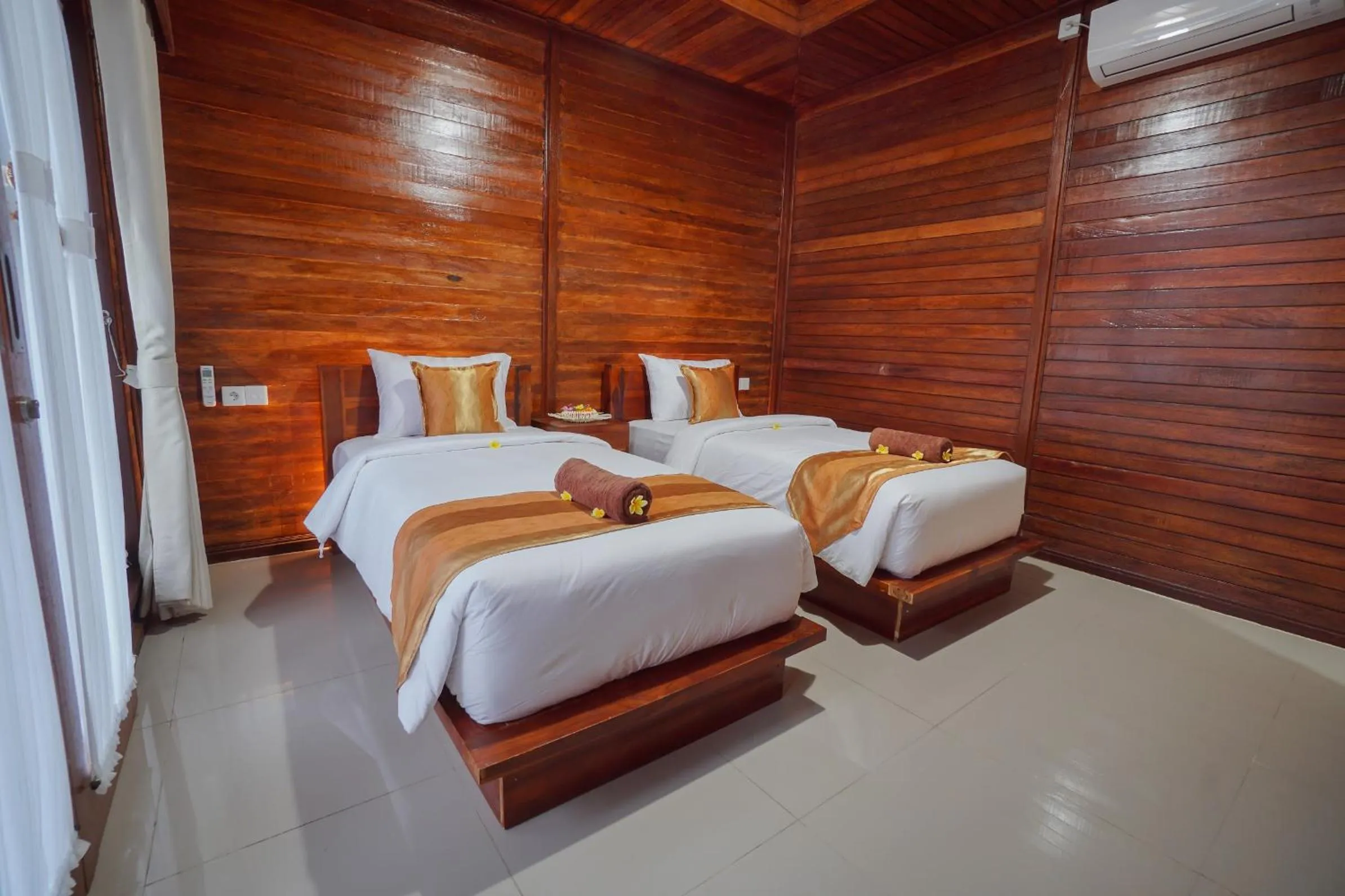 Bed in Kawi Penida Room