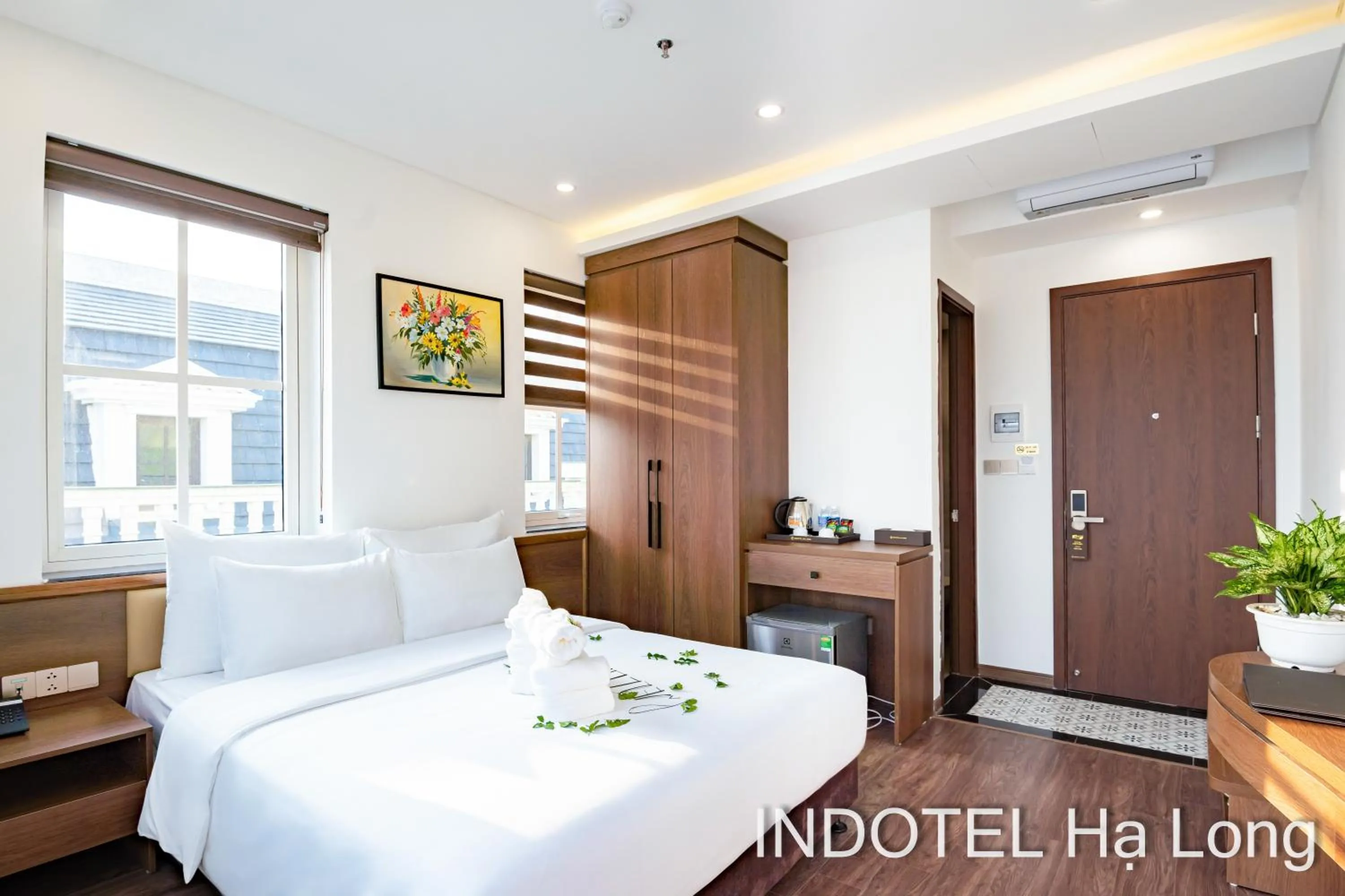 Bed in INDOTEL HALONG HOTEL