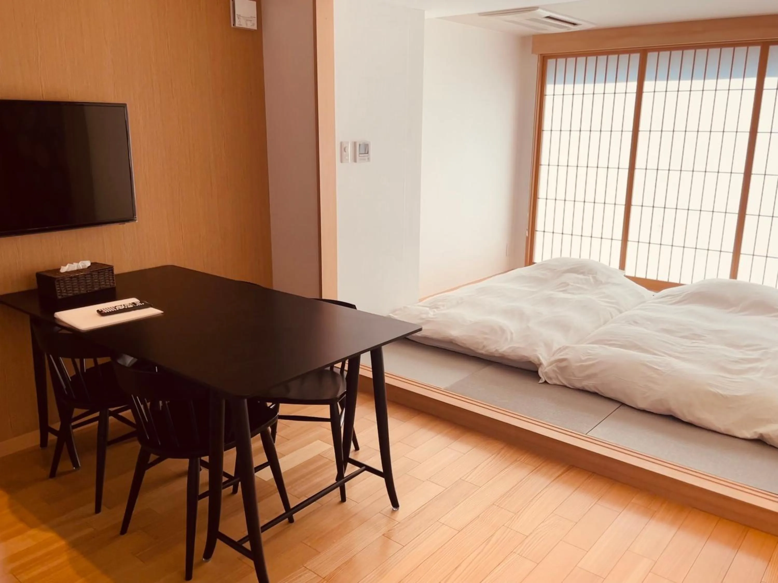 Seating area, Bed in Nplus Tokyo Akihabara Premium