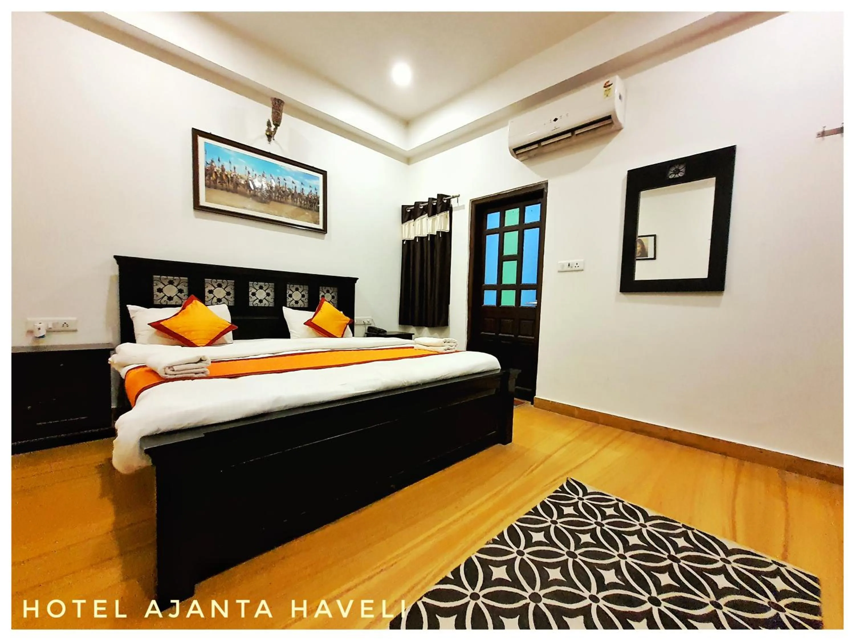 Bed in Hotel Ajanta Haveli