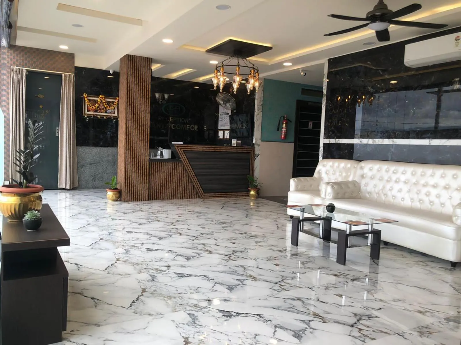 Lobby or reception in Eshanya Comforts