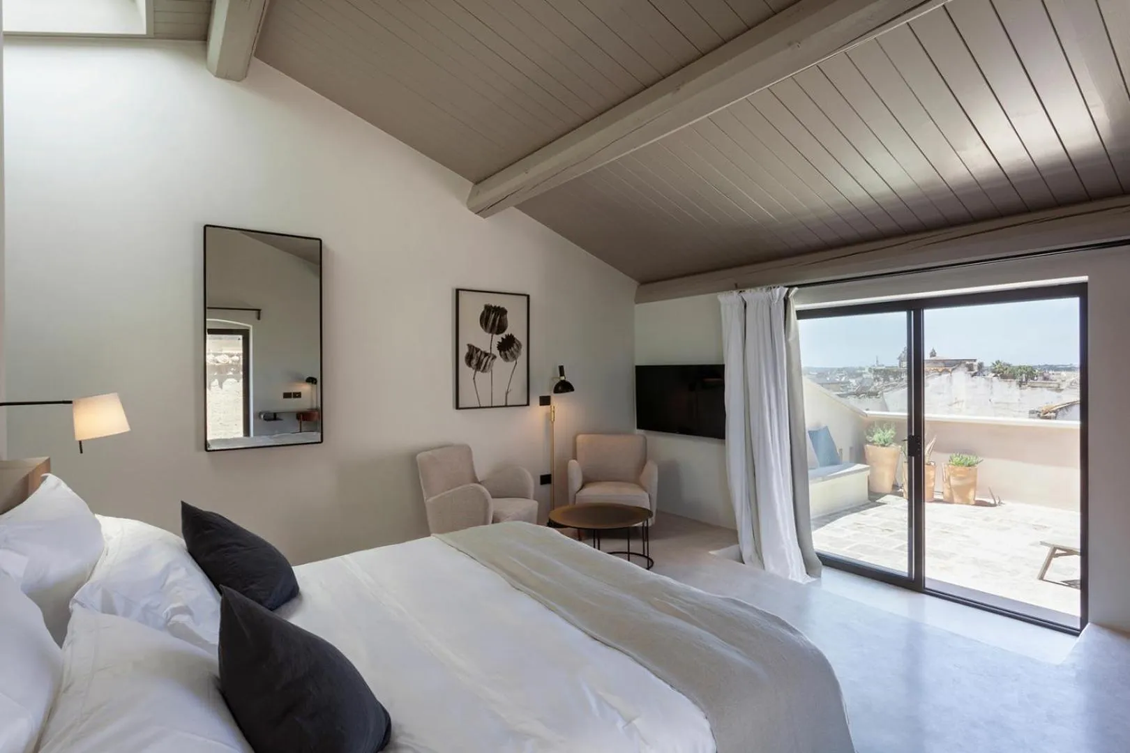 Bed in Palazzo Tafuri Boutique Hotel