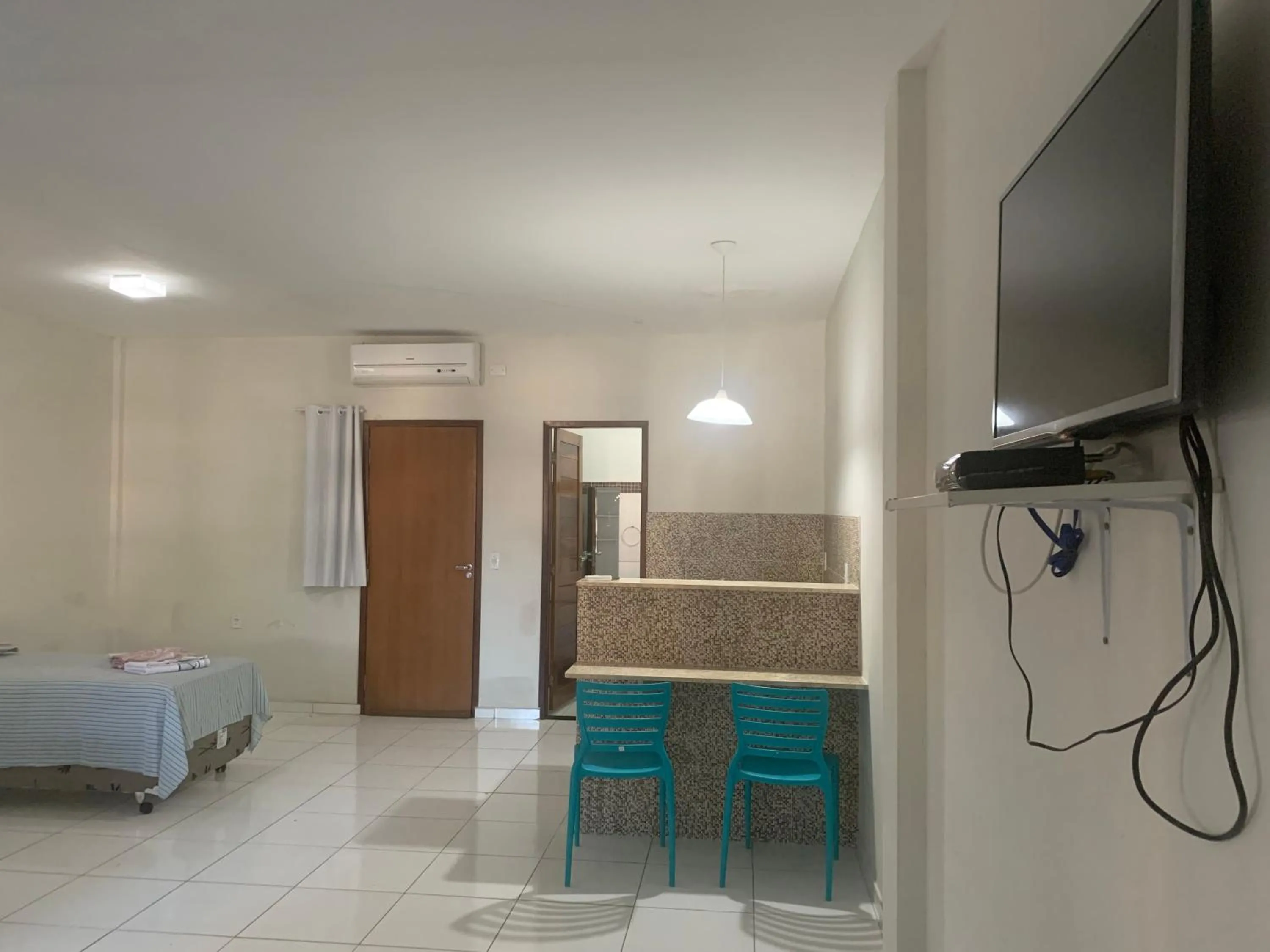 Bed in Pousada Vovó Haidê