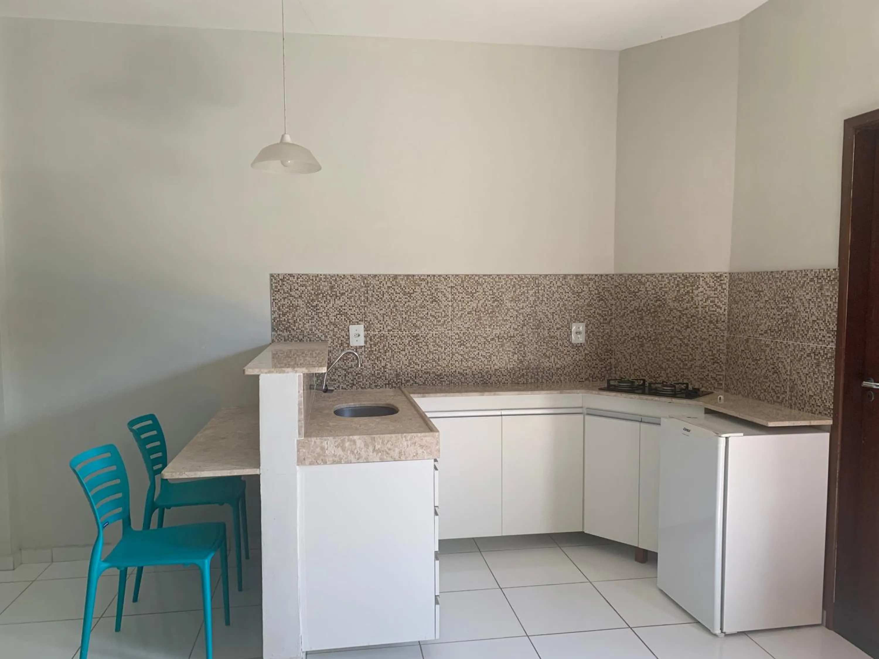 Kitchen or kitchenette in Pousada Vovó Haidê